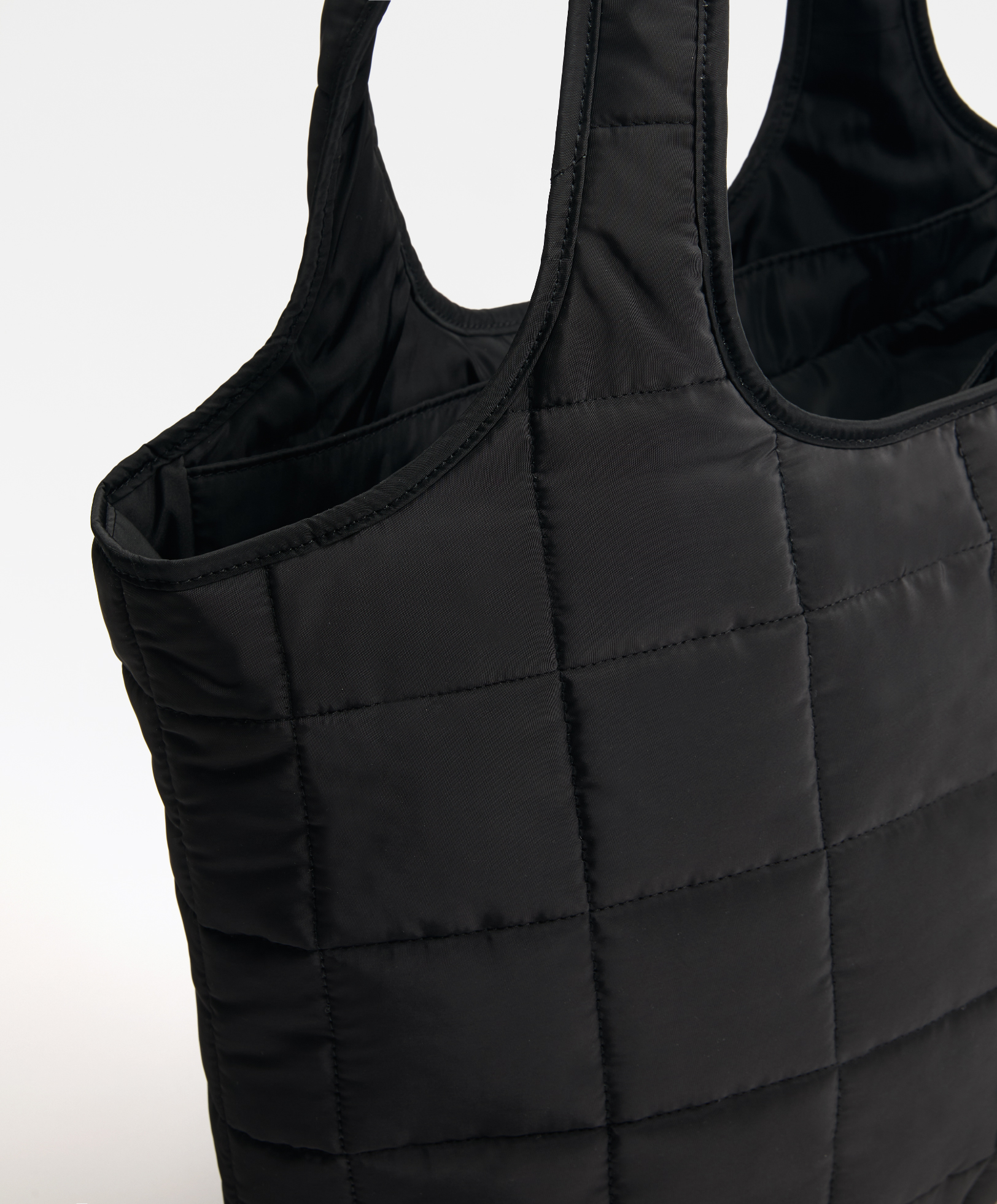 Padded bag with thermal pocket