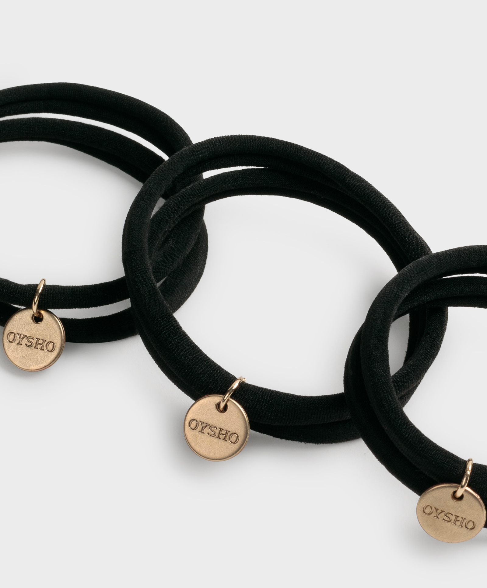 6 Oysho plaque hair ties