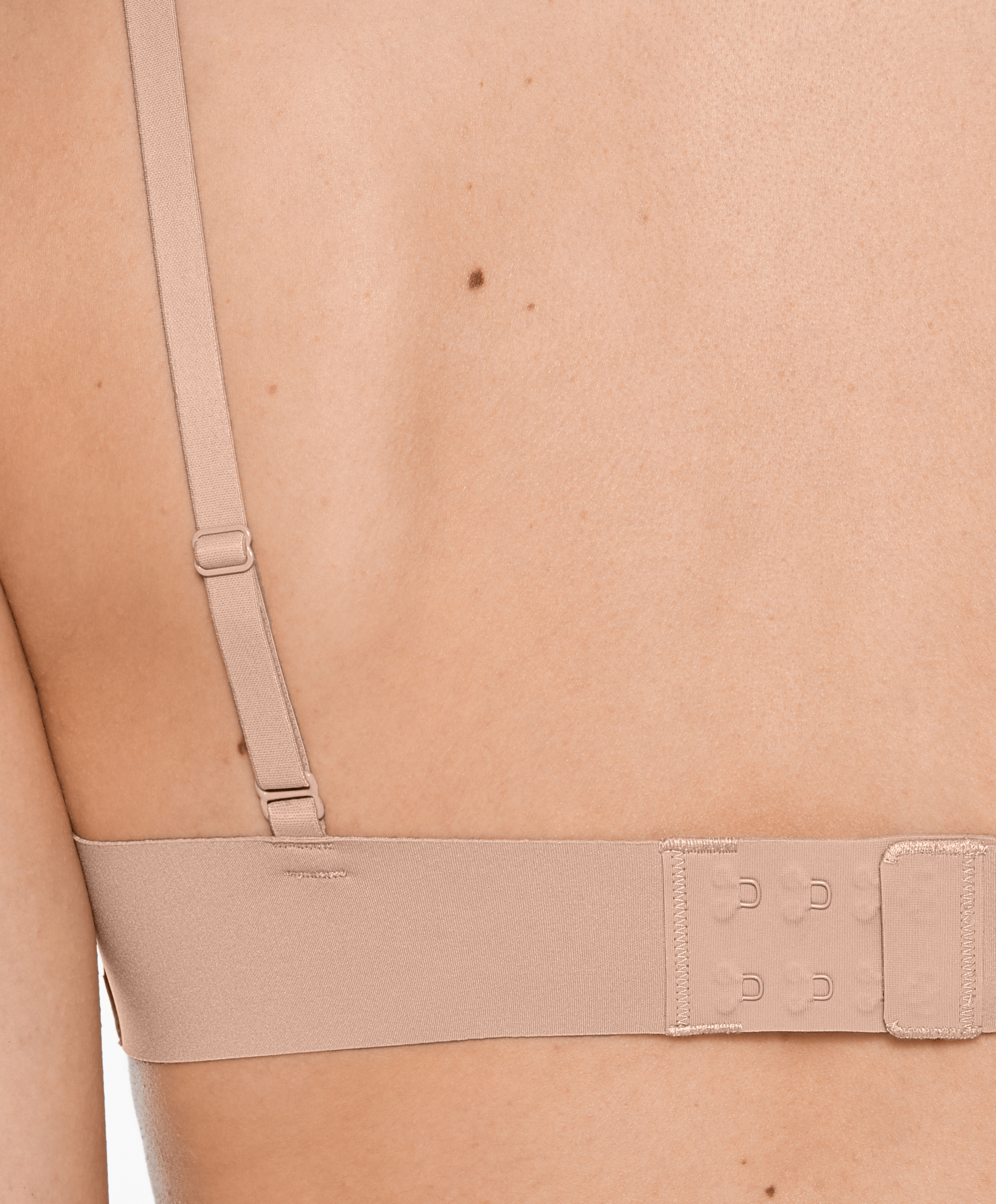 Invisible laser-cut triangle bra