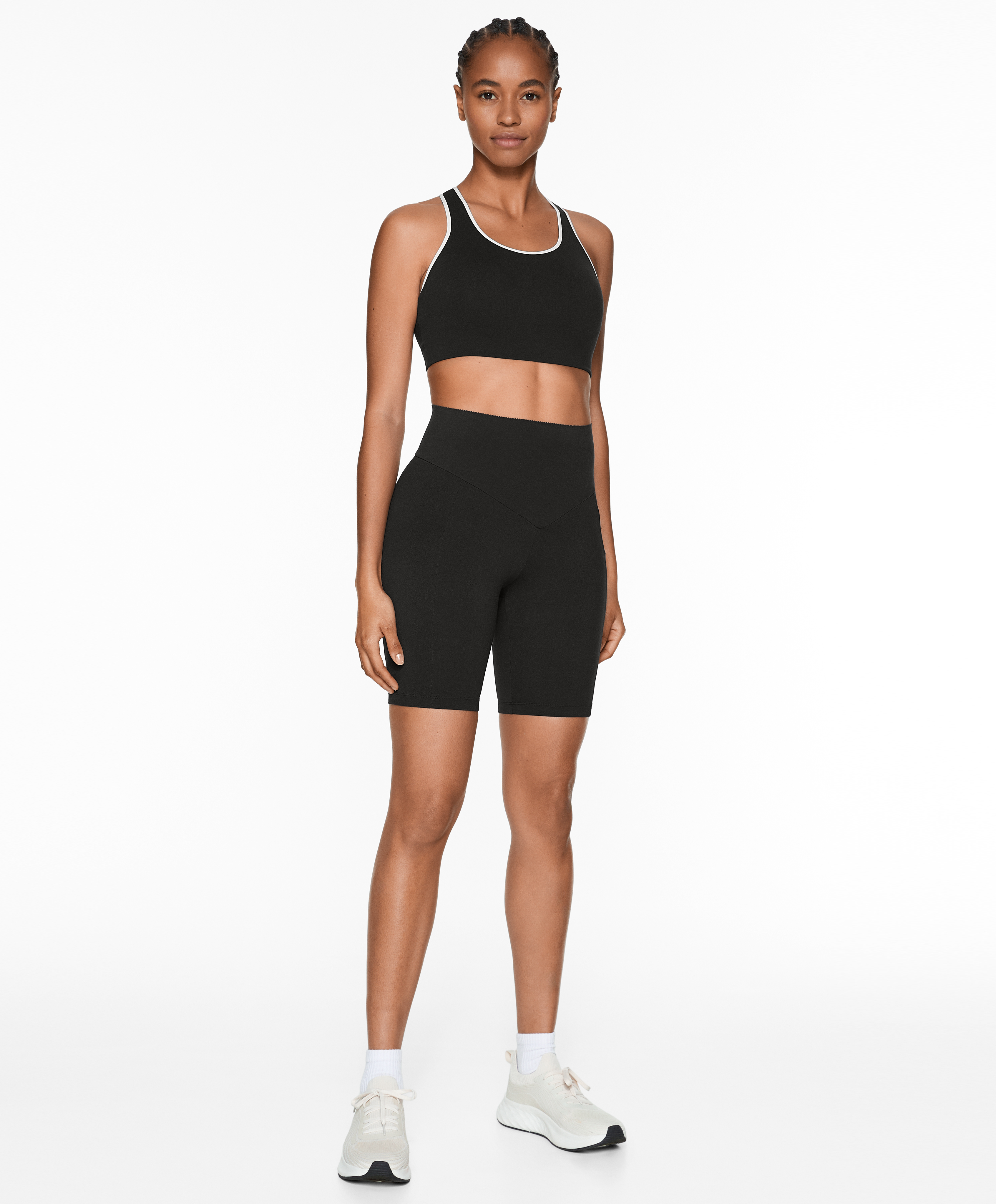 Firm support compressive sports bra with piping