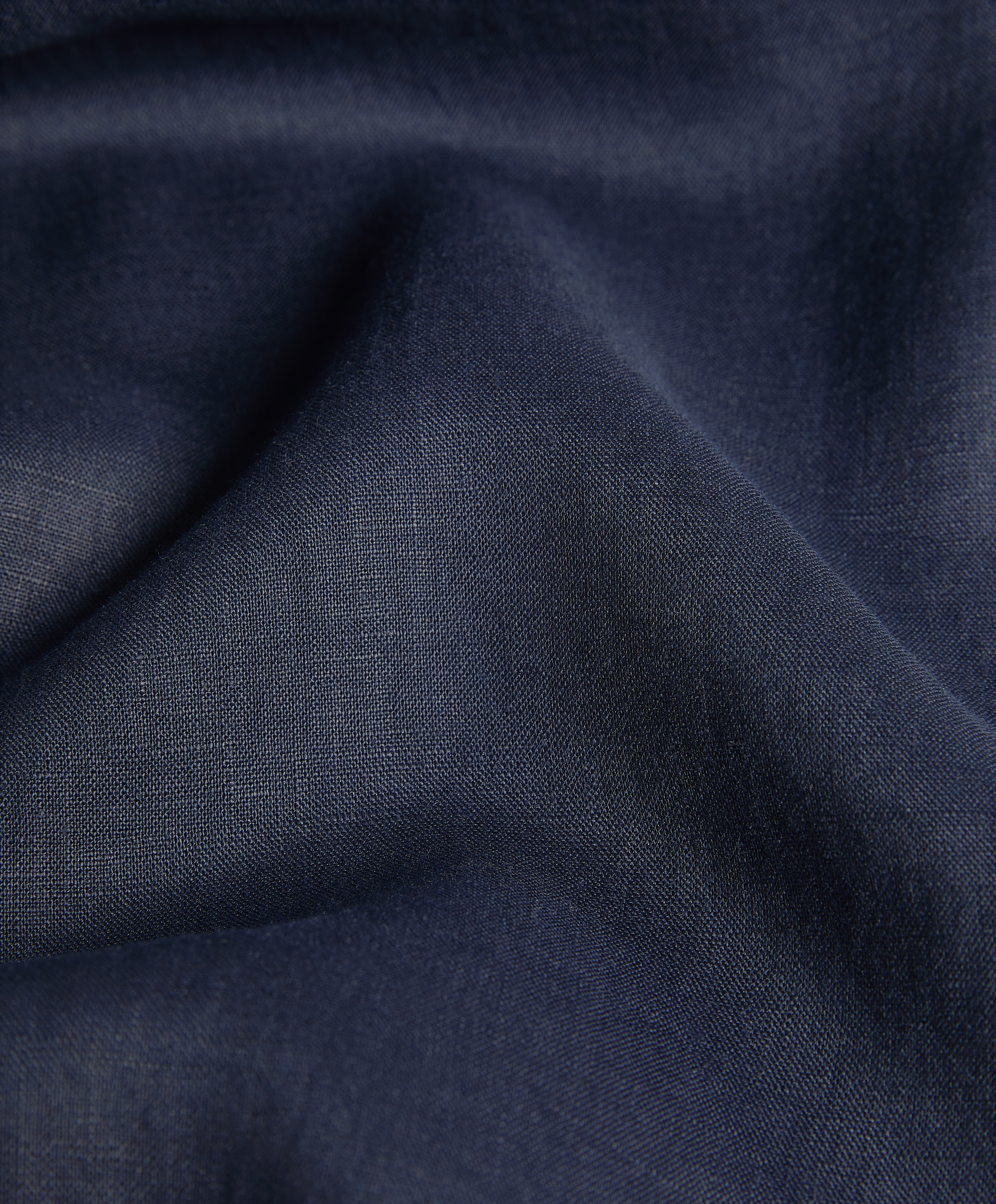 Trousers with linen appliqué along the sides