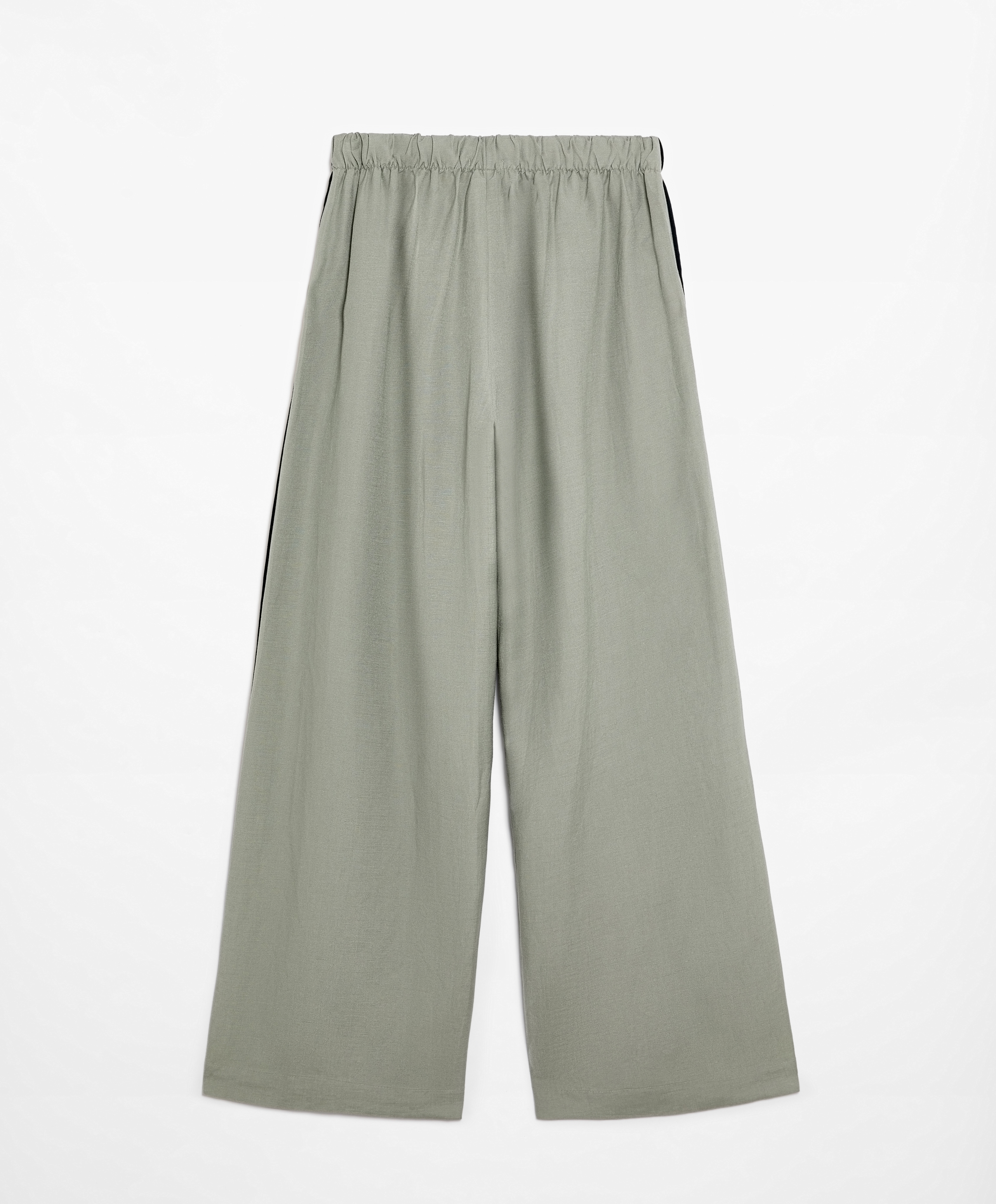 Trousers with linen appliqué along the sides