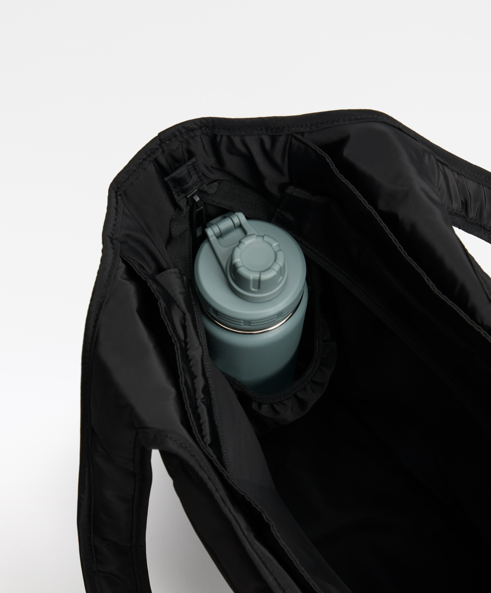 Padded bag with thermal pocket