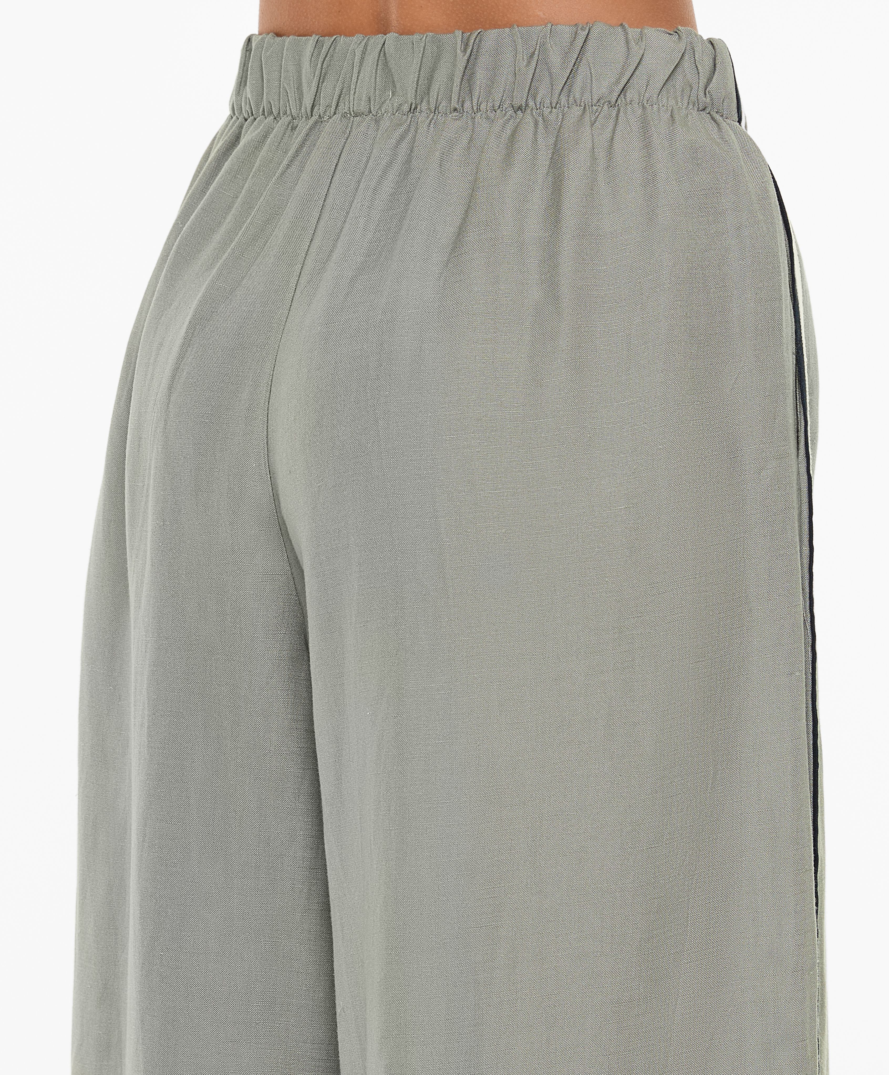 Trousers with linen appliqué along the sides