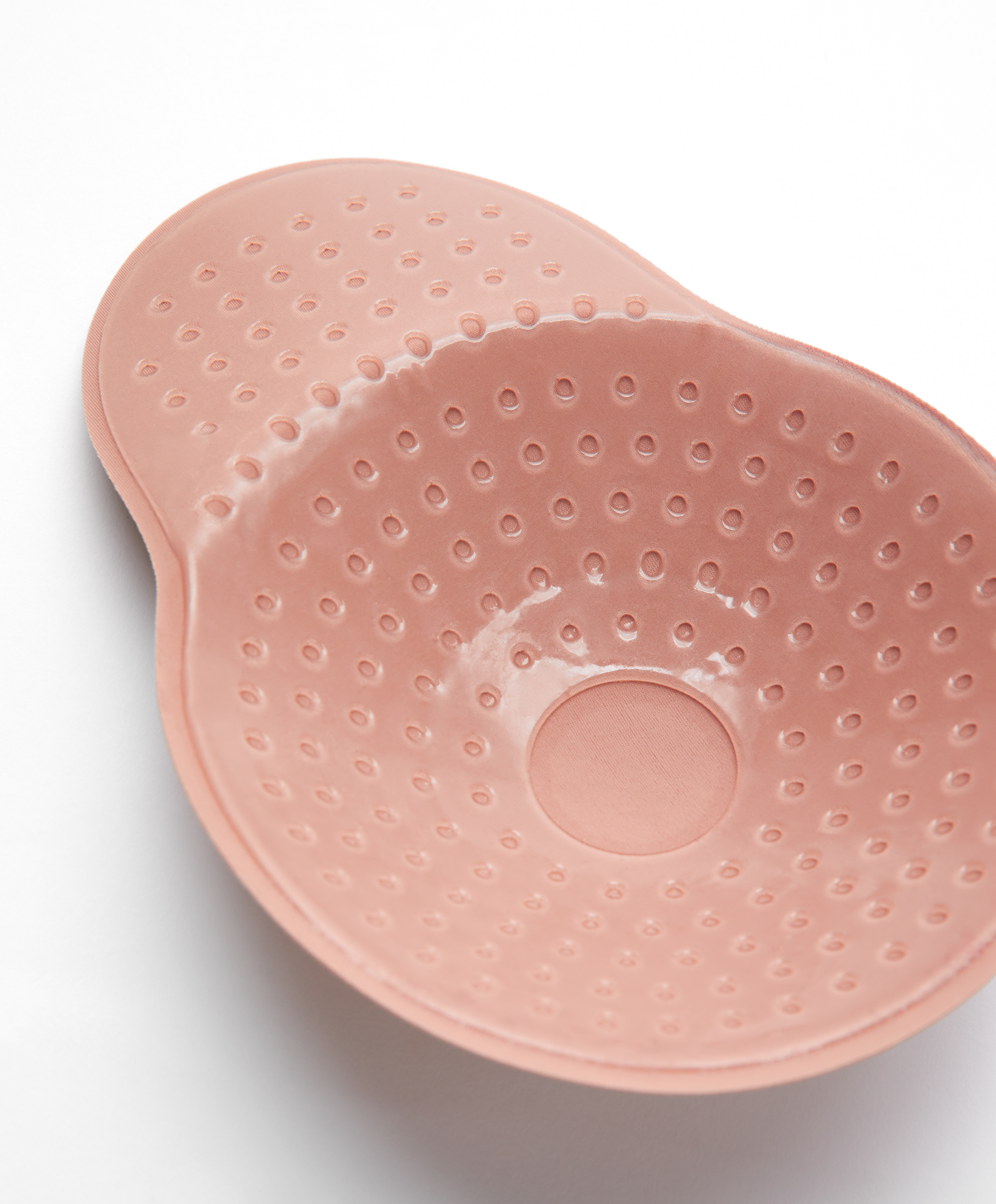 Adhesive fabric bust-enhancing cups