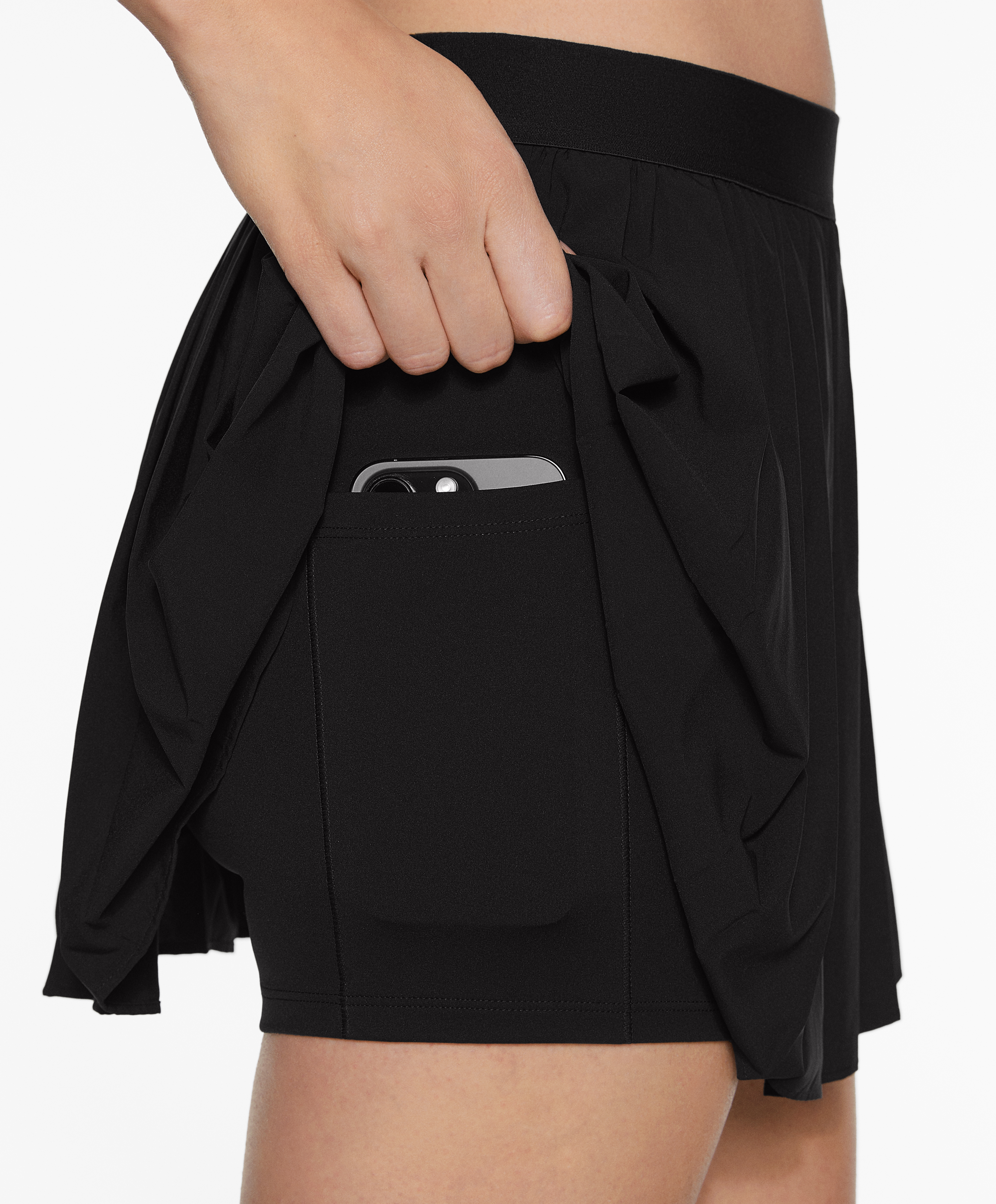 Pleated compressive skirt