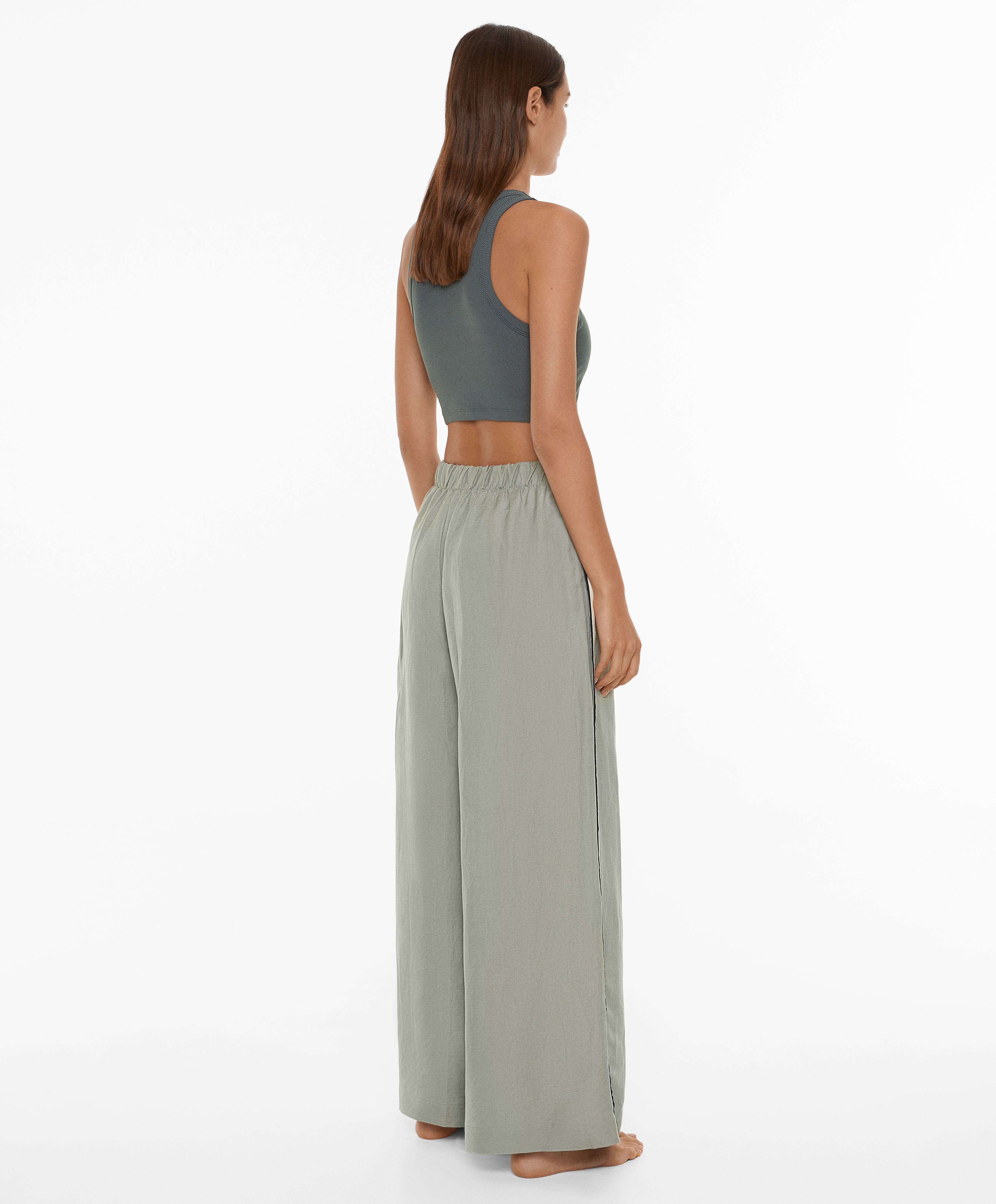 Trousers with linen appliqué along the sides