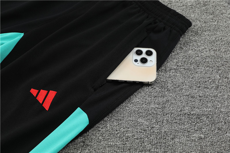 Manchester United 23-24 Kids Long Sleeve Training Set Green - SOCCERDEALSHOP