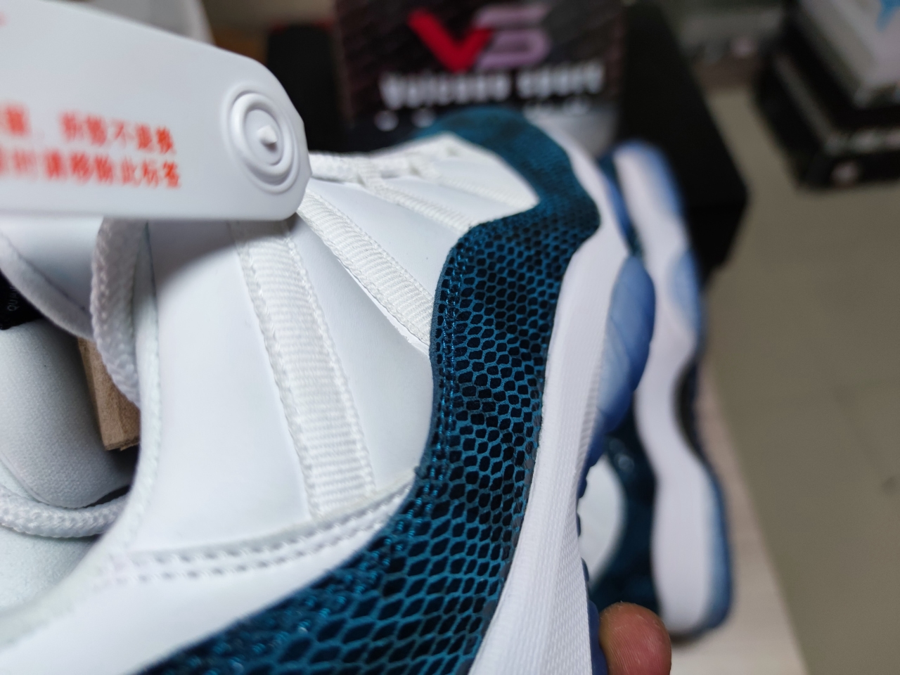 Jordan 11 “Navy Blue Snakeskin”