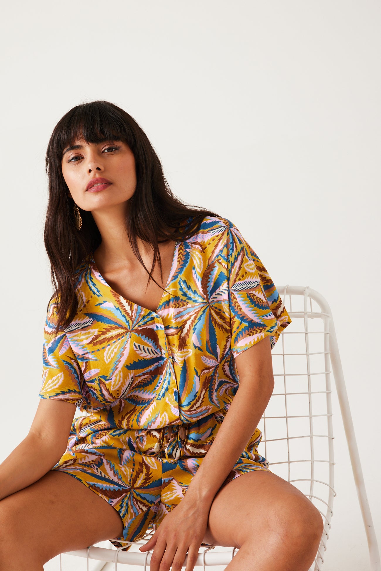 Patterned shorts playsuit - Ochre print