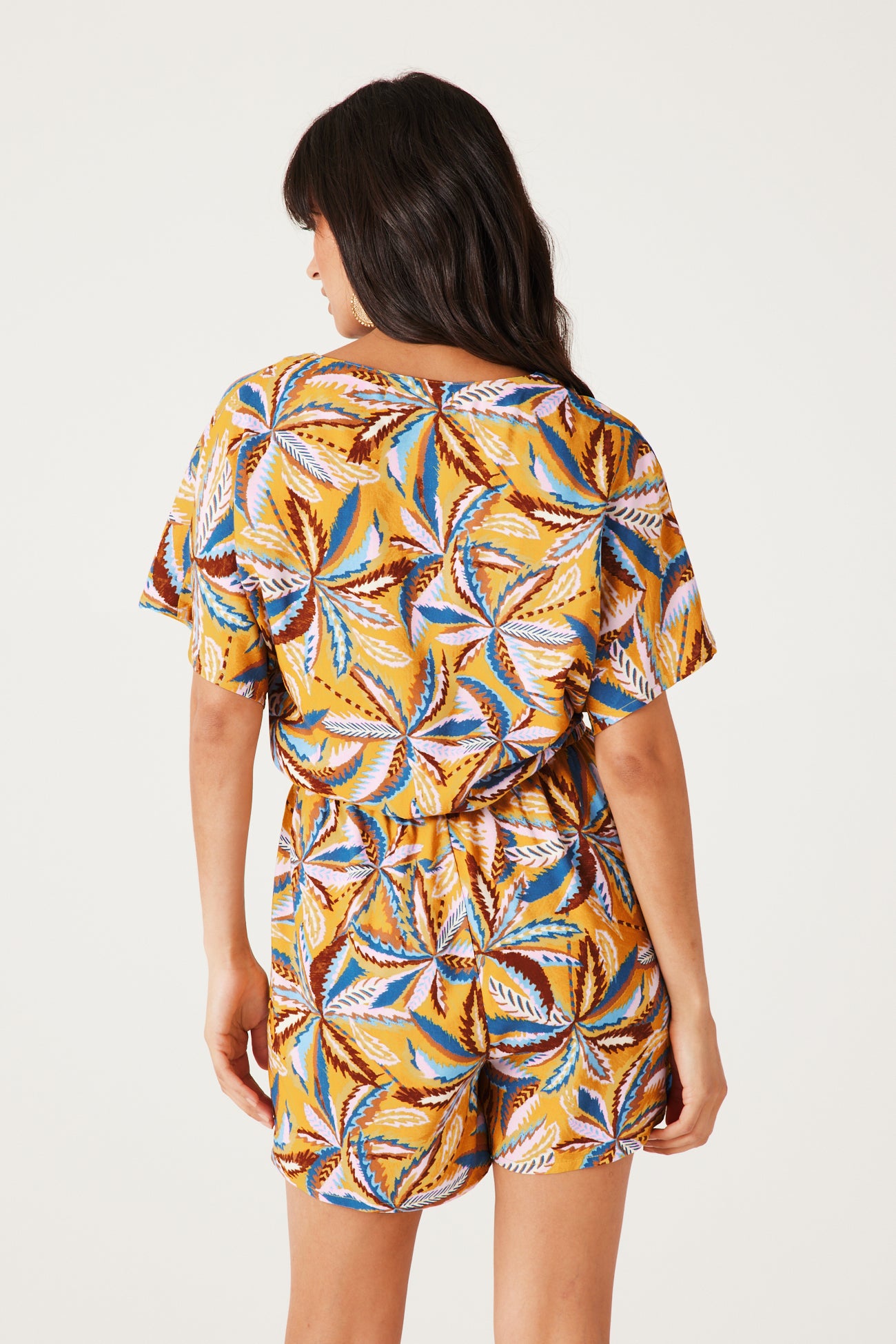 Patterned shorts playsuit - Ochre print