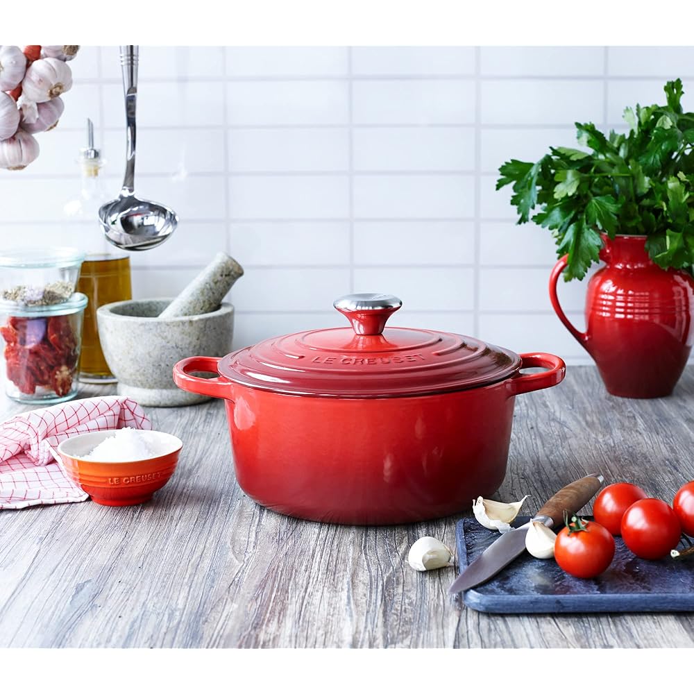 Le Creuset Enameled Cast Iron Signature Round Dutch Oven, 5.5 qt., Cerise: Home & Kitchen