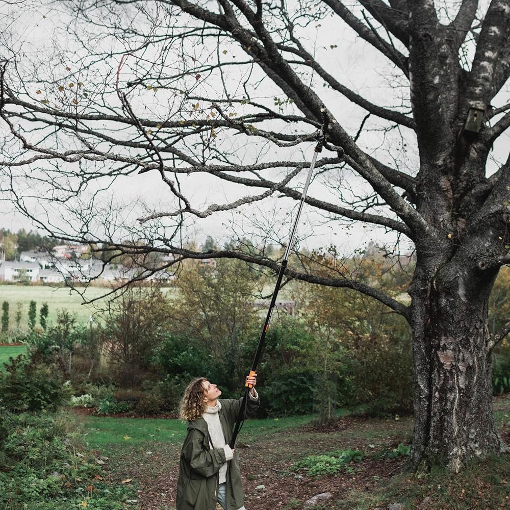 : Fiskars 2-in-1 Extendable Tree Pruner and Pole Saw (Extends 7.9 - 12 feet) with Rotating Head, Pruning Stik Model with15-Inch Double-Grind Saw Blade, and Double Locking System : Hand Pruners : Patio, Lawn & Garden
