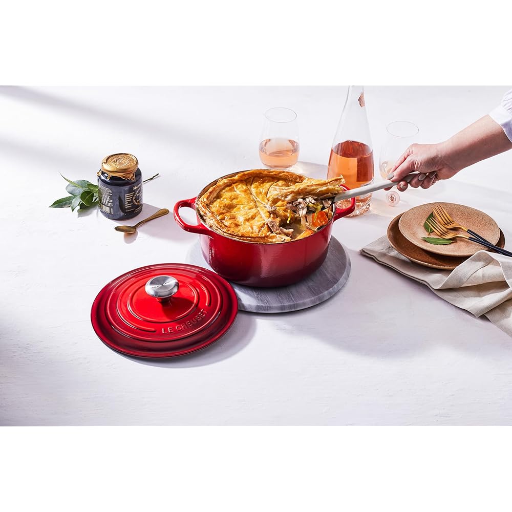 Le Creuset Enameled Cast Iron Signature Round Dutch Oven, 5.5 qt., Cerise: Home & Kitchen
