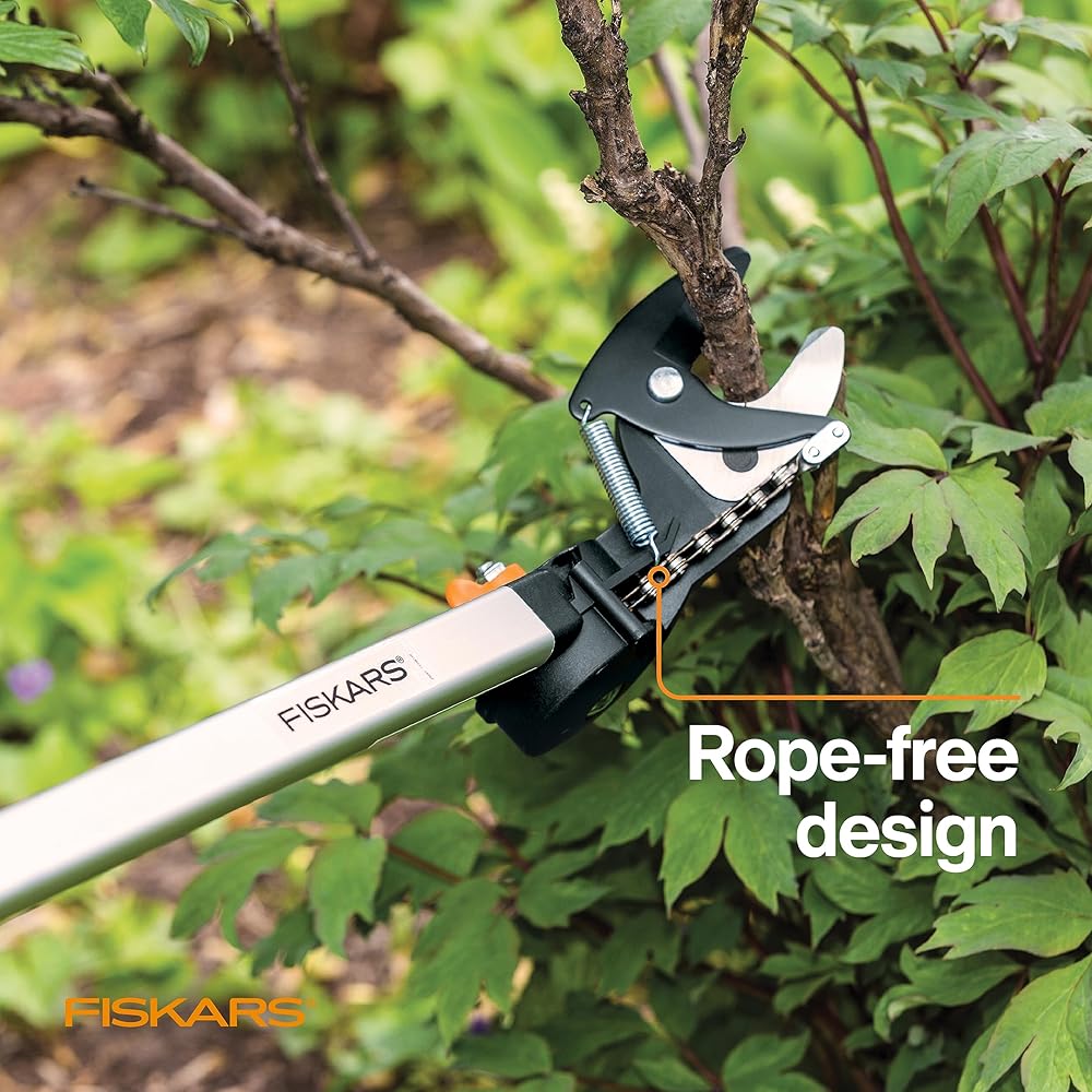 : Fiskars 2-in-1 Extendable Tree Pruner and Pole Saw (Extends 7.9 - 12 feet) with Rotating Head, Pruning Stik Model with15-Inch Double-Grind Saw Blade, and Double Locking System : Hand Pruners : Patio, Lawn & Garden