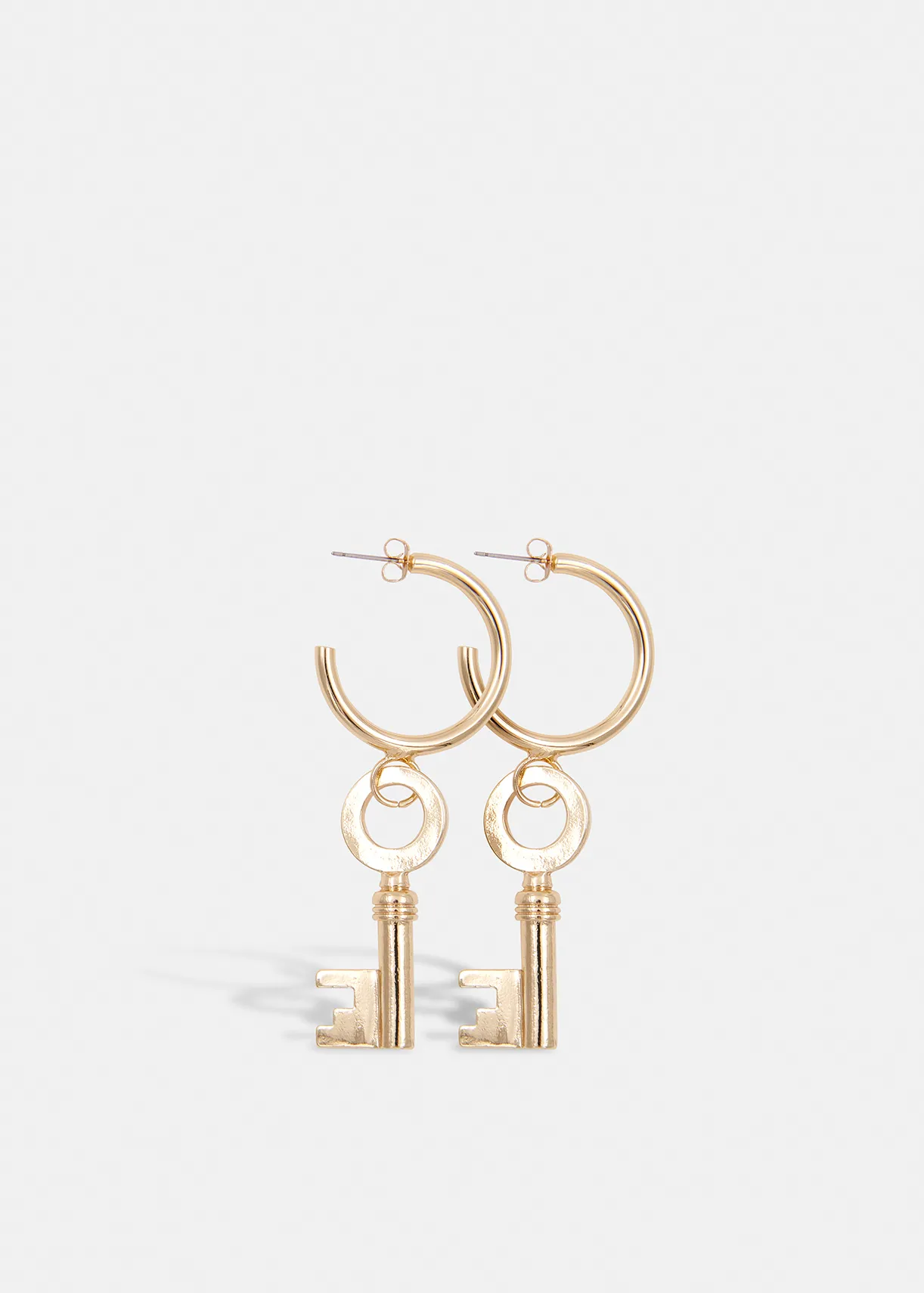 Gold-tone hoop earrings with key pendants