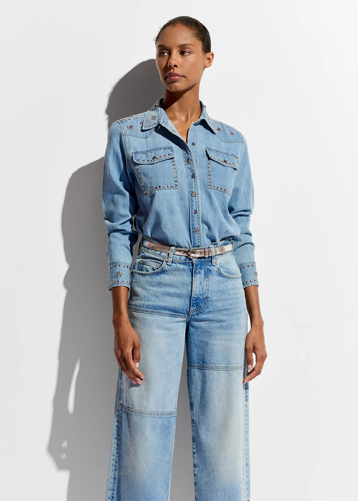 Blue denim shirt with stud embellishments