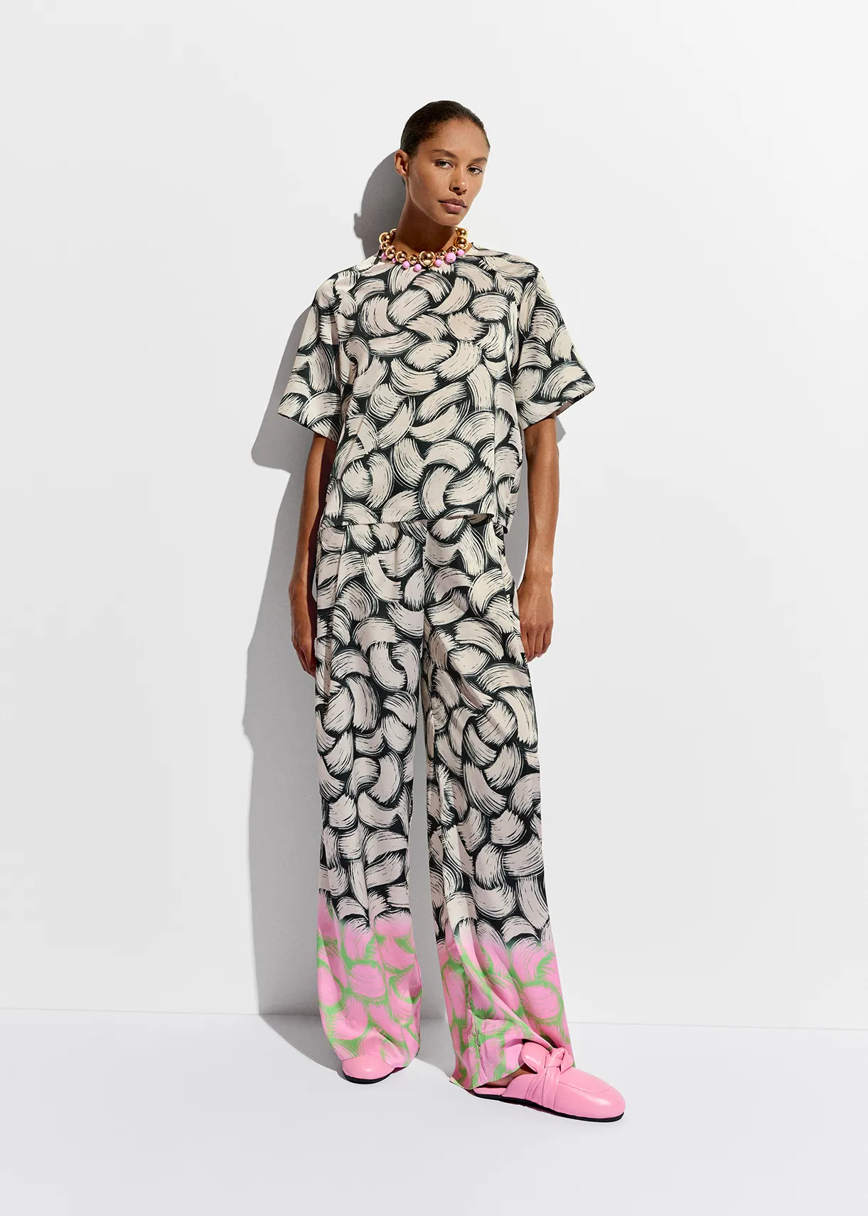 Black, off-white and pink abstract-print wide-leg pants