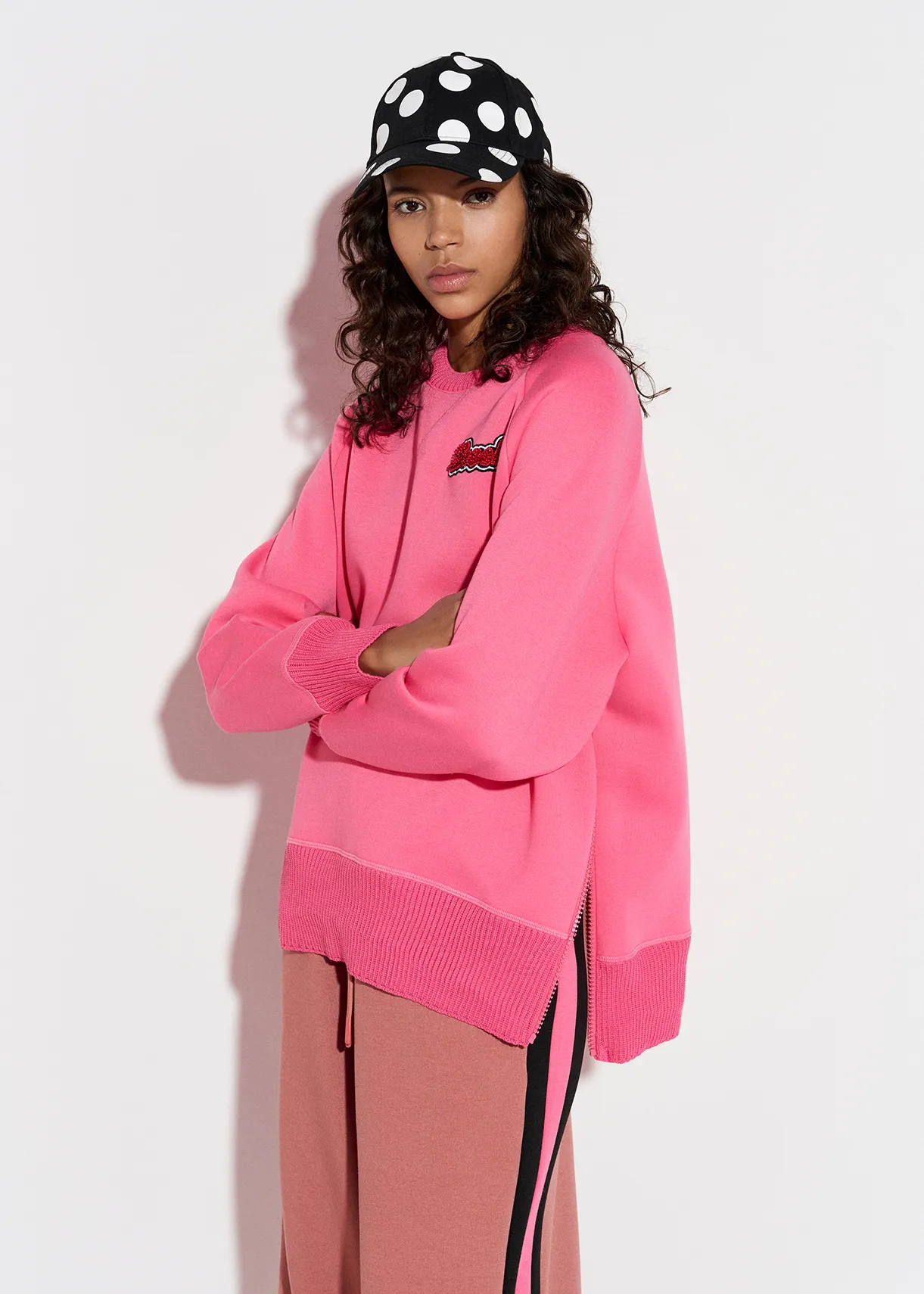 Pink sweatshirt with bead embellishment