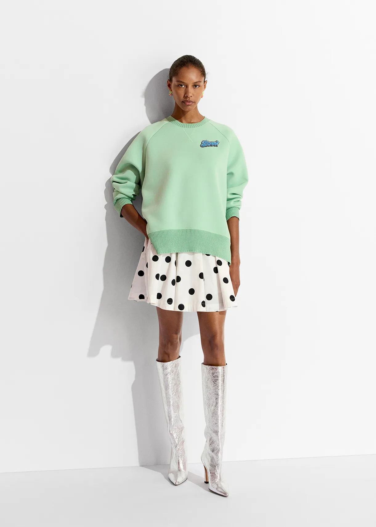Mint green sweatshirt with bead embellishment