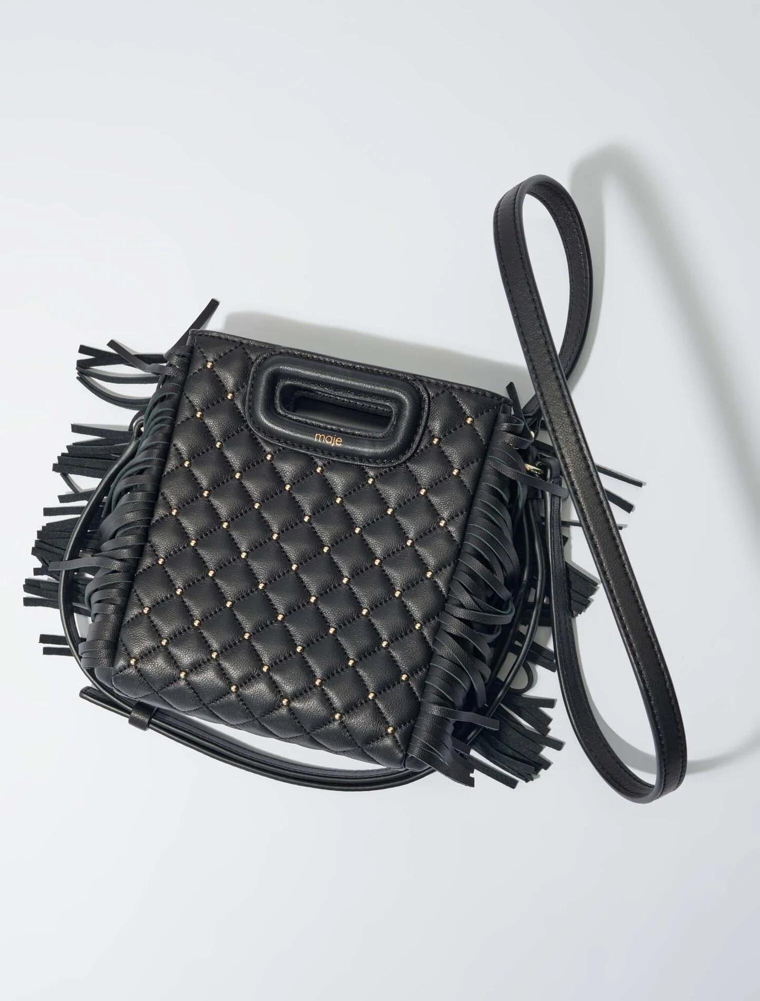 Studded M quilted leather mini bag