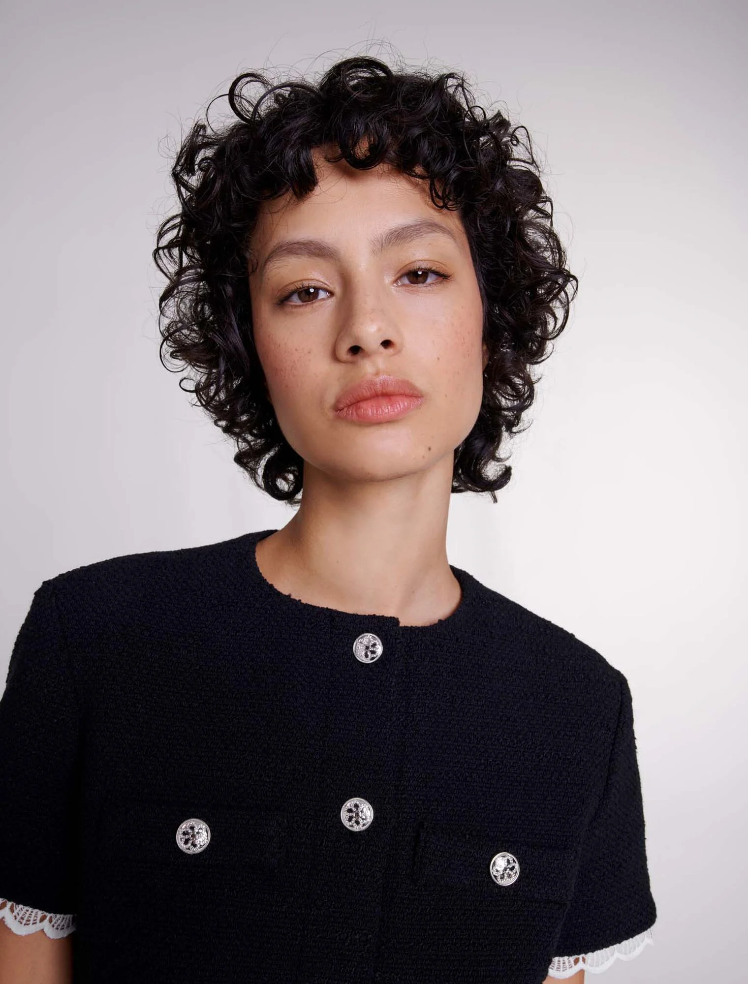 Short tweed dress with trim