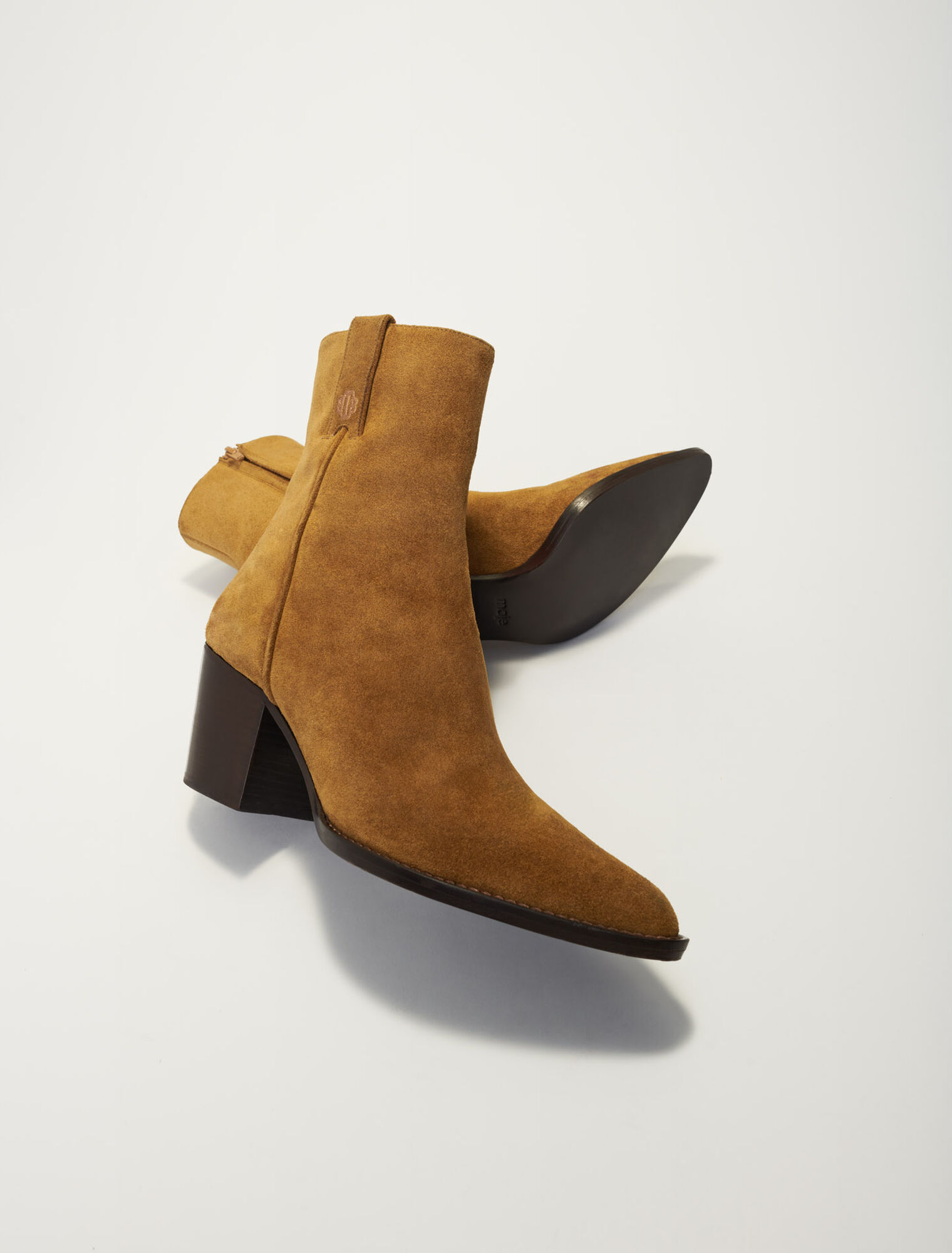 Cowboy boots in camel suede leather