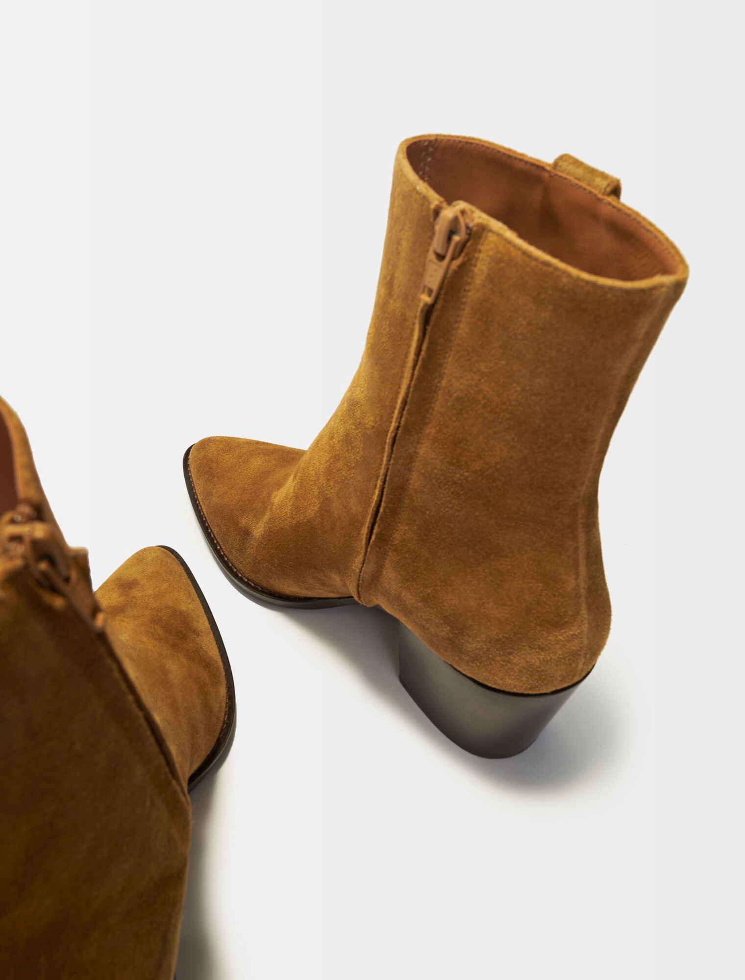 Cowboy boots in camel suede leather