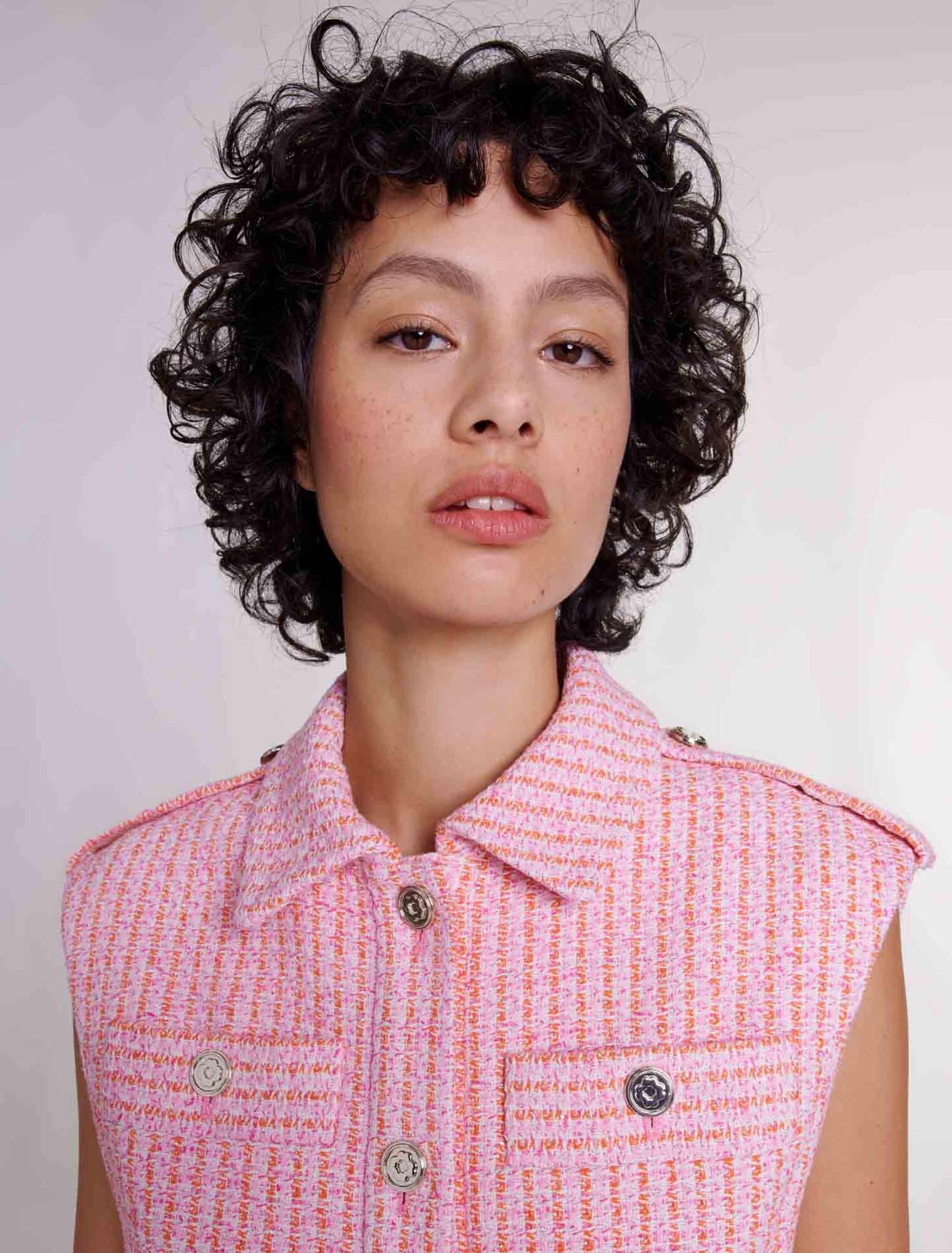 Sleeveless tweed jacket