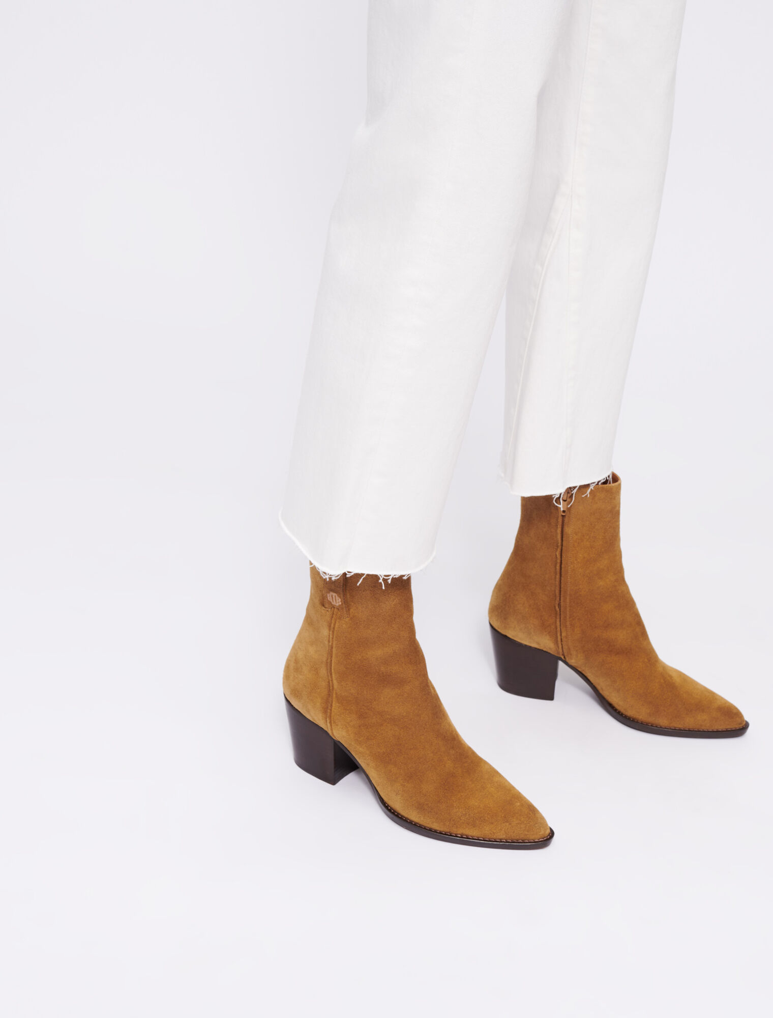 Cowboy boots in camel suede leather