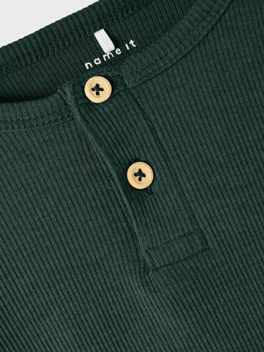 GERIBDE KNOOP TOP MET LANGE MOUWEN