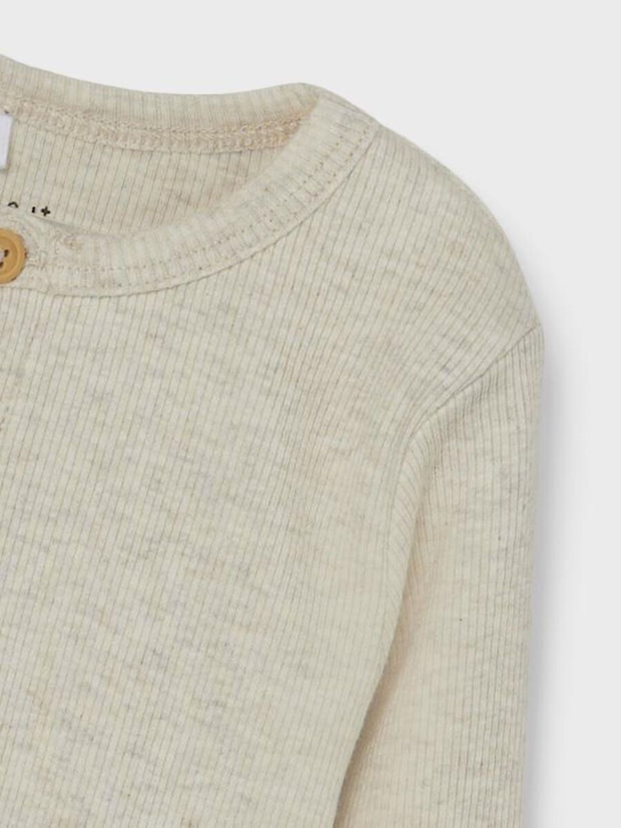 GERIBDE KNOOP TOP MET LANGE MOUWEN