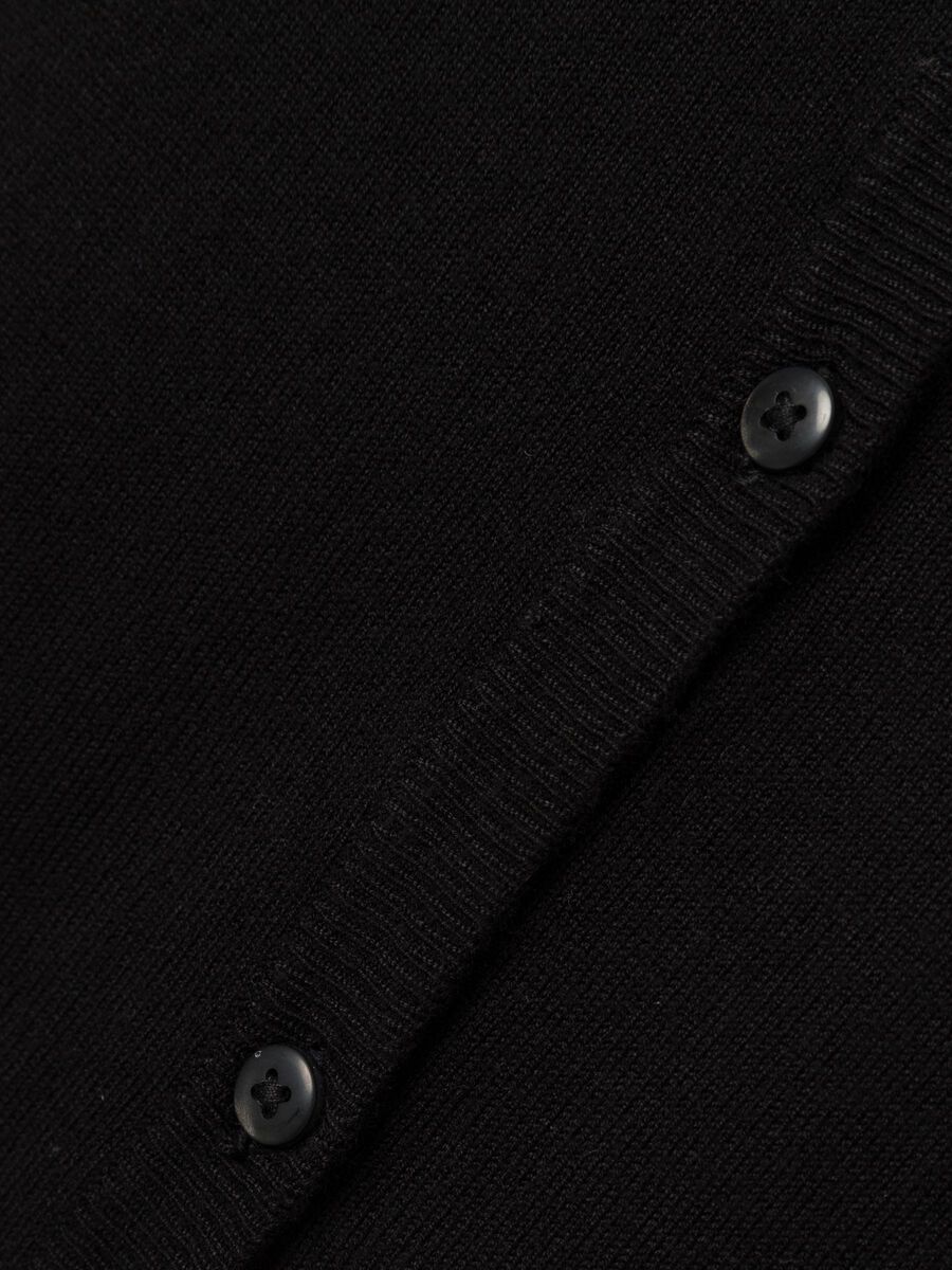 LANGE MOUWEN GEBREID VEST