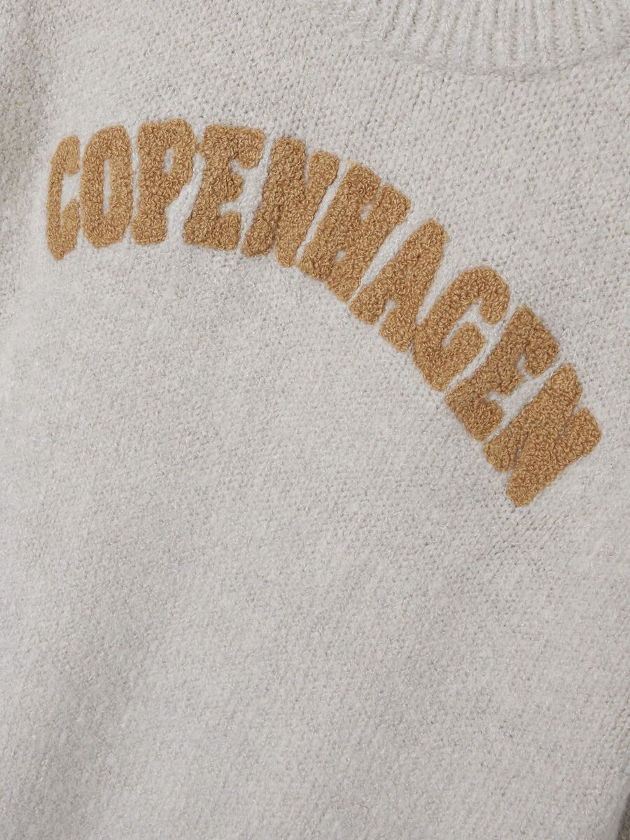 LANGE MOUWEN GEBREIDE TRUI