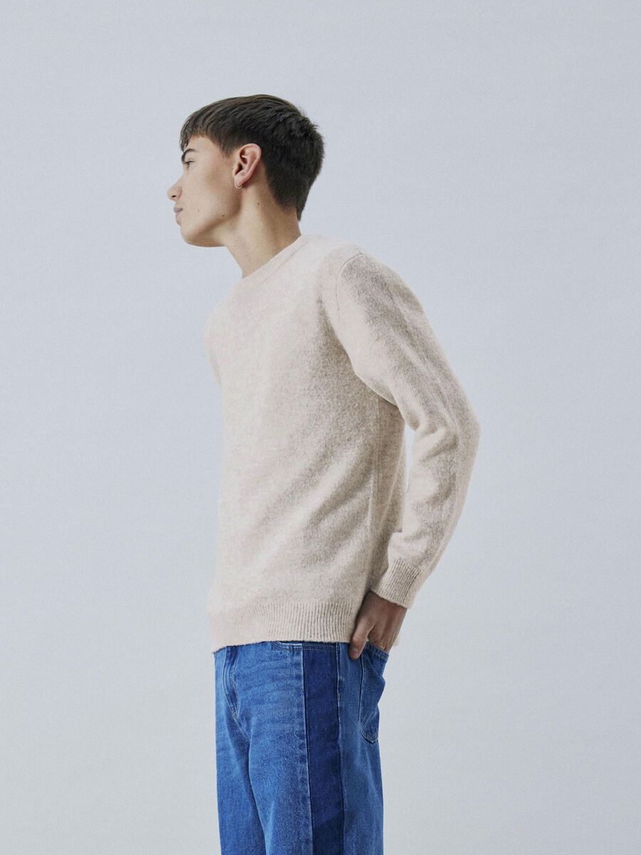 LANGE MOUWEN GEBREIDE TOP