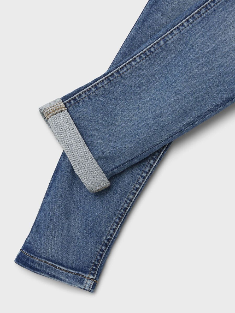 X SLIM FIT STRETCH JEANS
