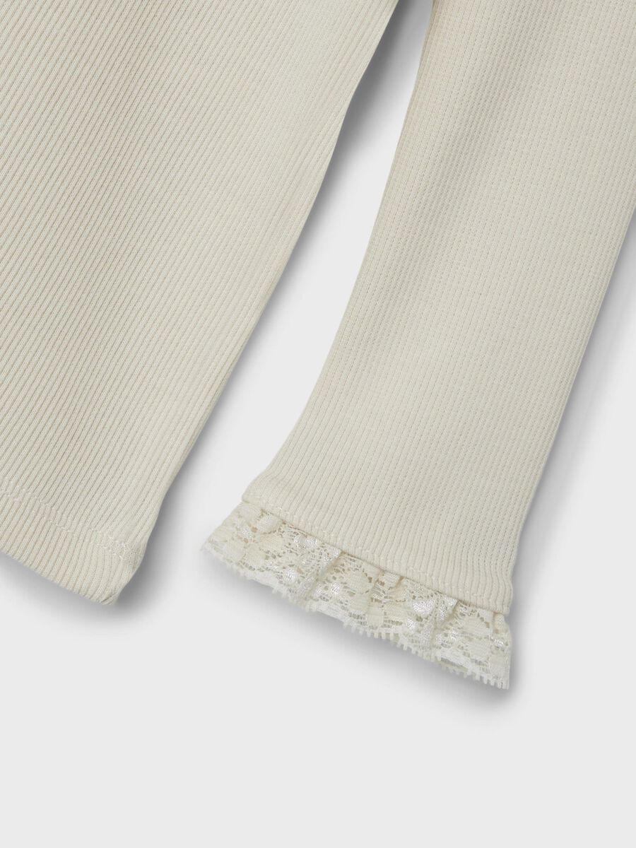 RIBGEBREID TOP MET LANGE MOUWEN