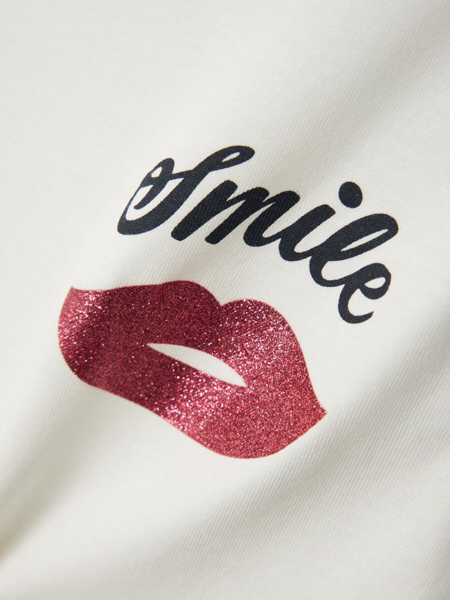 GLITTER PRINT TOP MET LANGE MOUWEN