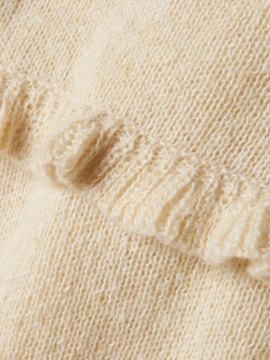 LANGE MOUWEN GEBREIDE TRUI