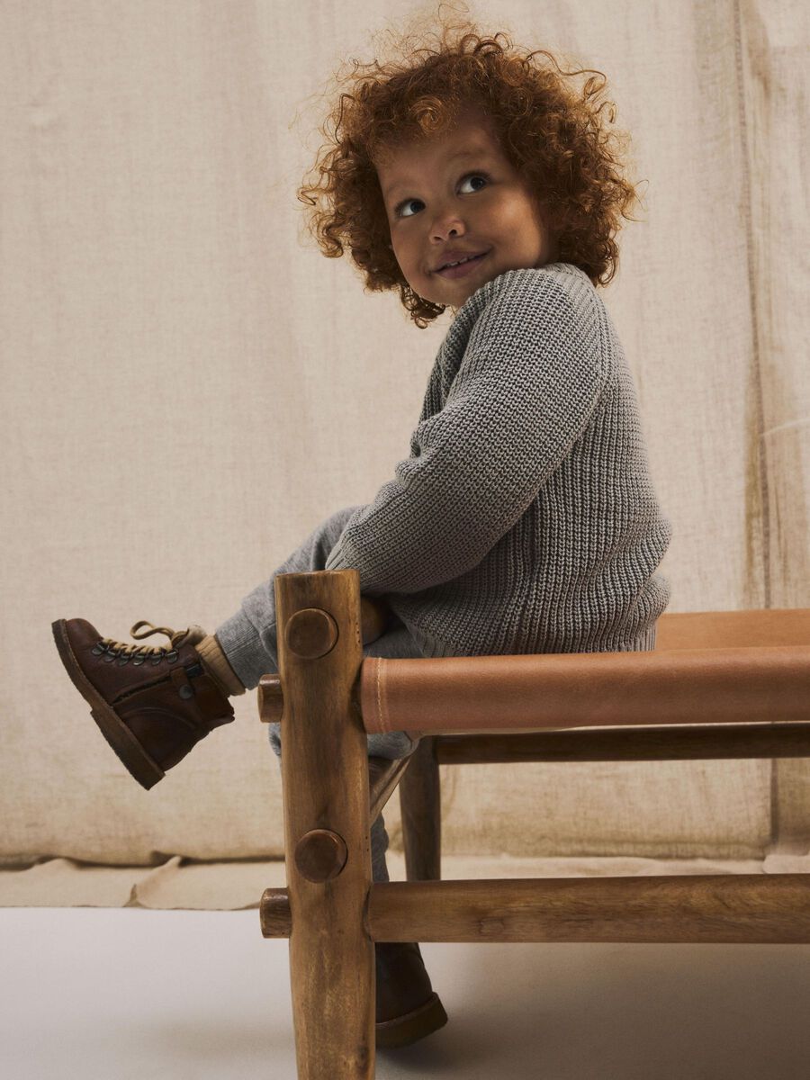 LANGE MOUWEN GEBREID VEST