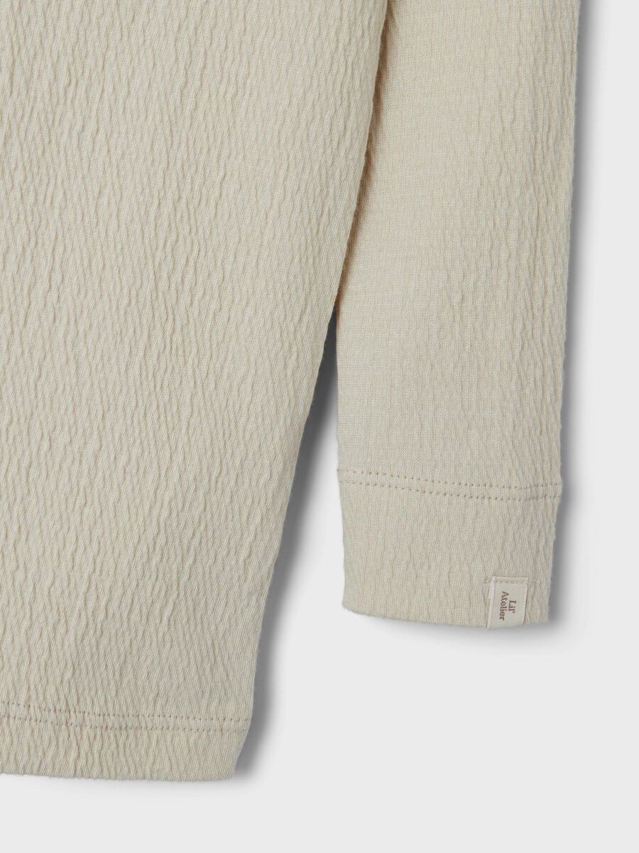 SLIM FIT TOP MET LANGE MOUWEN