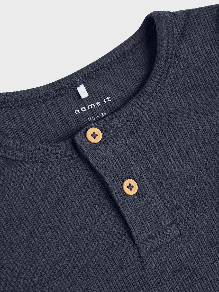 GERIBDE KNOOP TOP MET LANGE MOUWEN