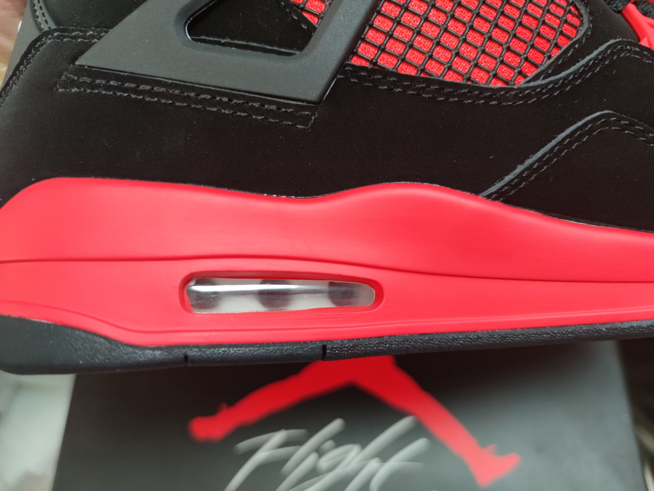 Jordan 4 “Red Thunder” CT8527-016