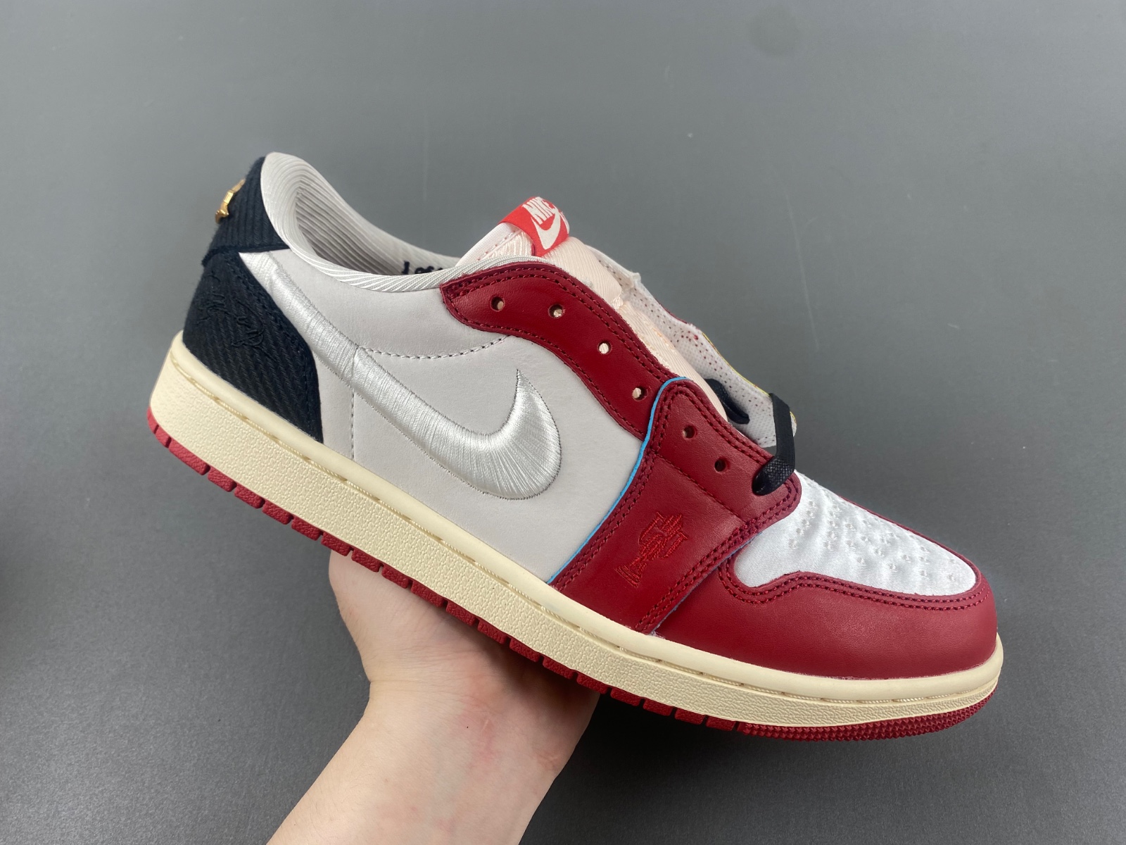 Air Jordan 1 Low OG x Trophy Room Sail and Varsity Red