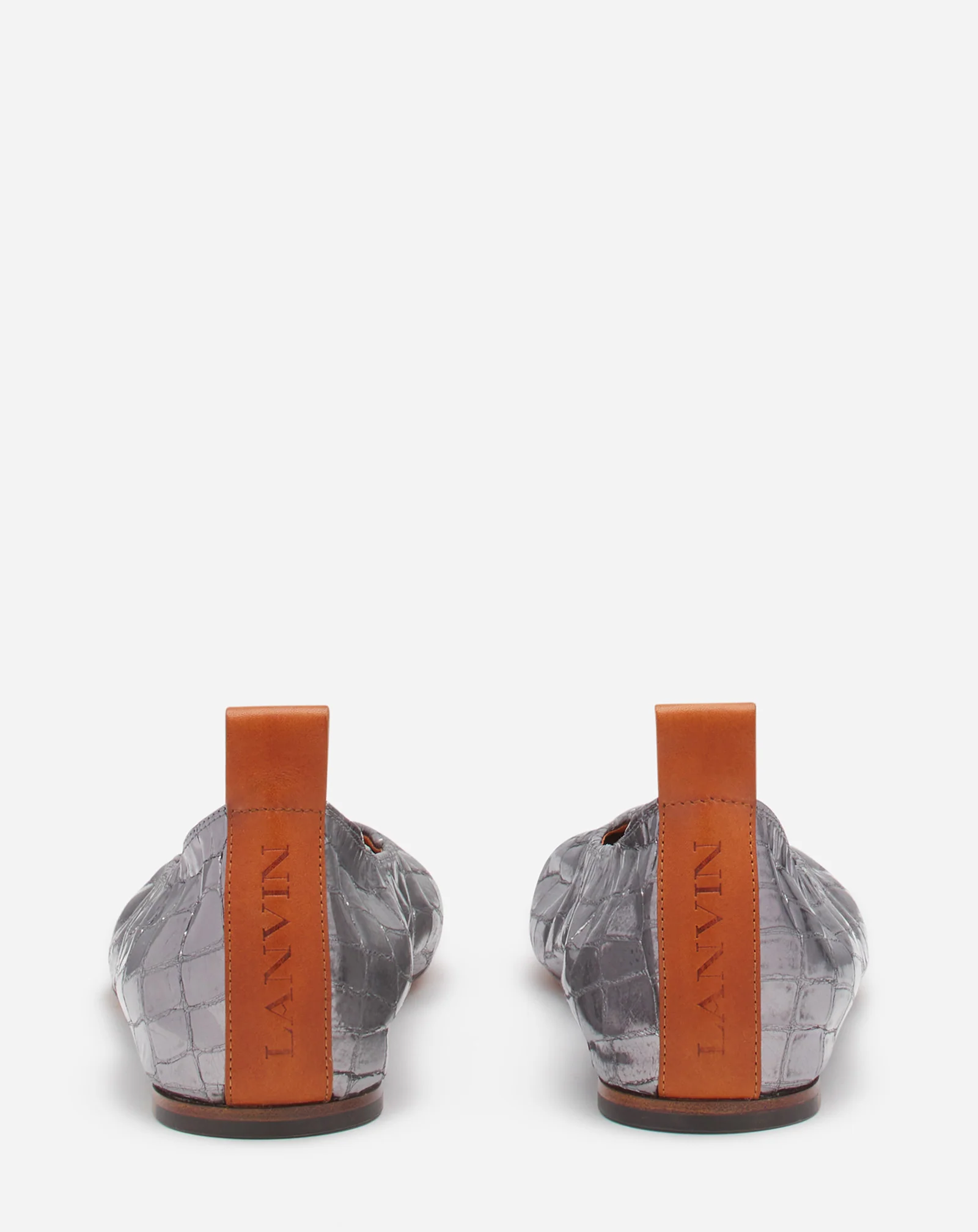 The ballerina in crocodile-effect leather