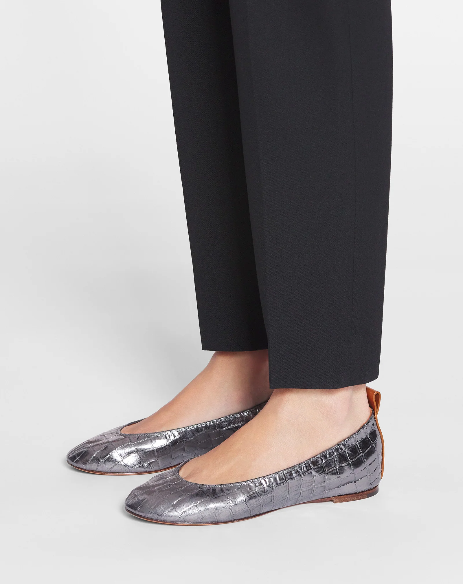 The ballerina in crocodile-effect leather
