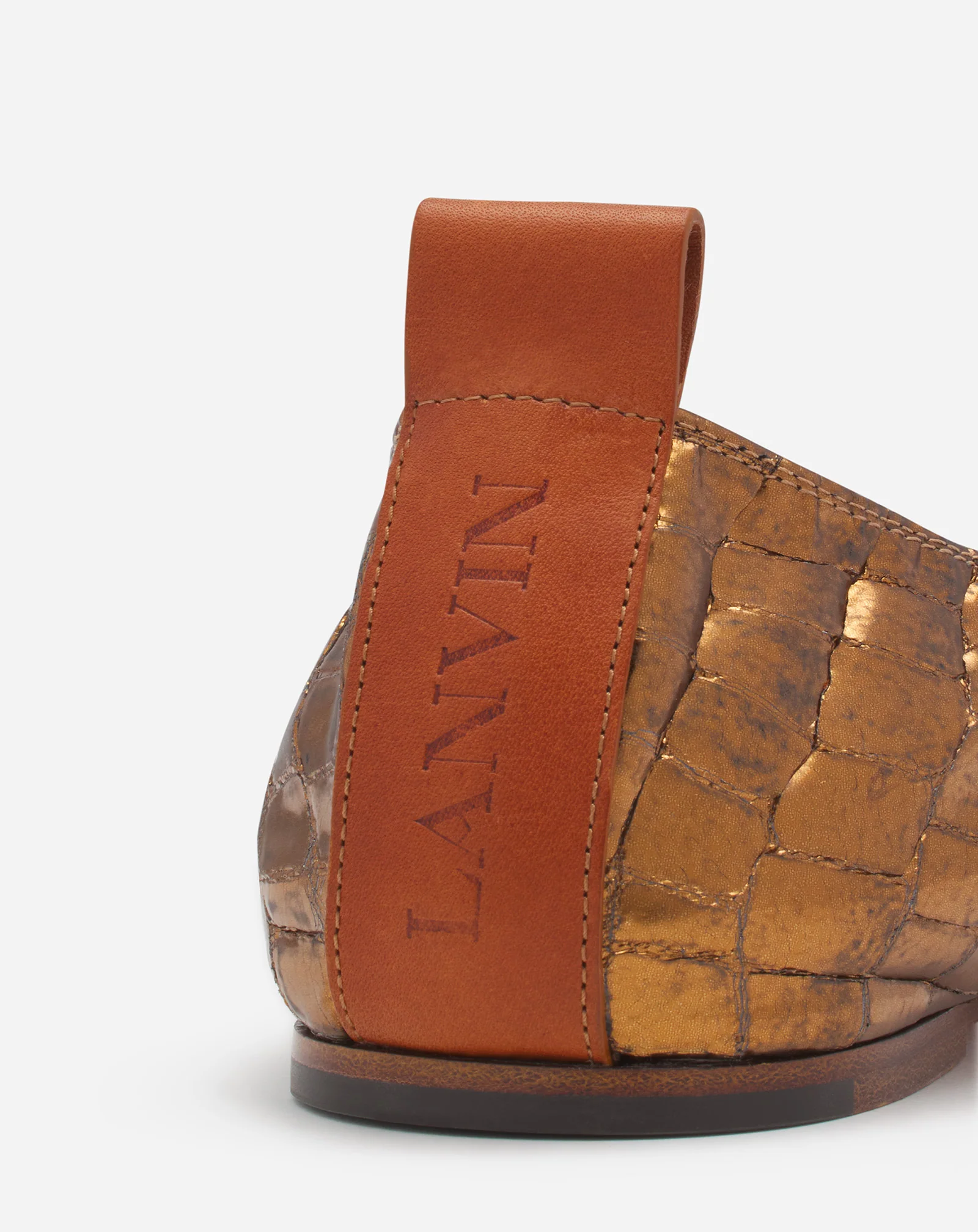 The ballerina in crocodile-effect leather