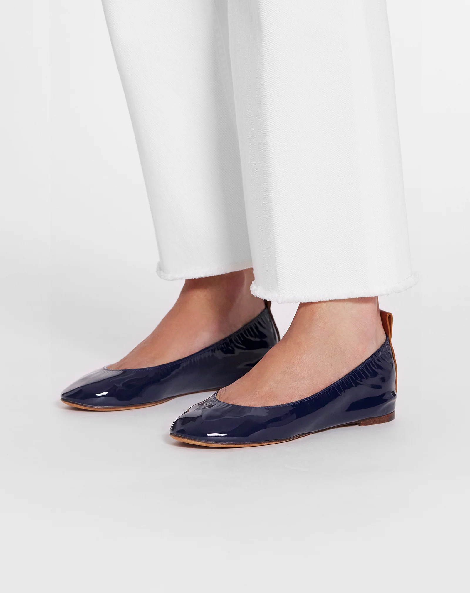 The ballerina flat in patent leather