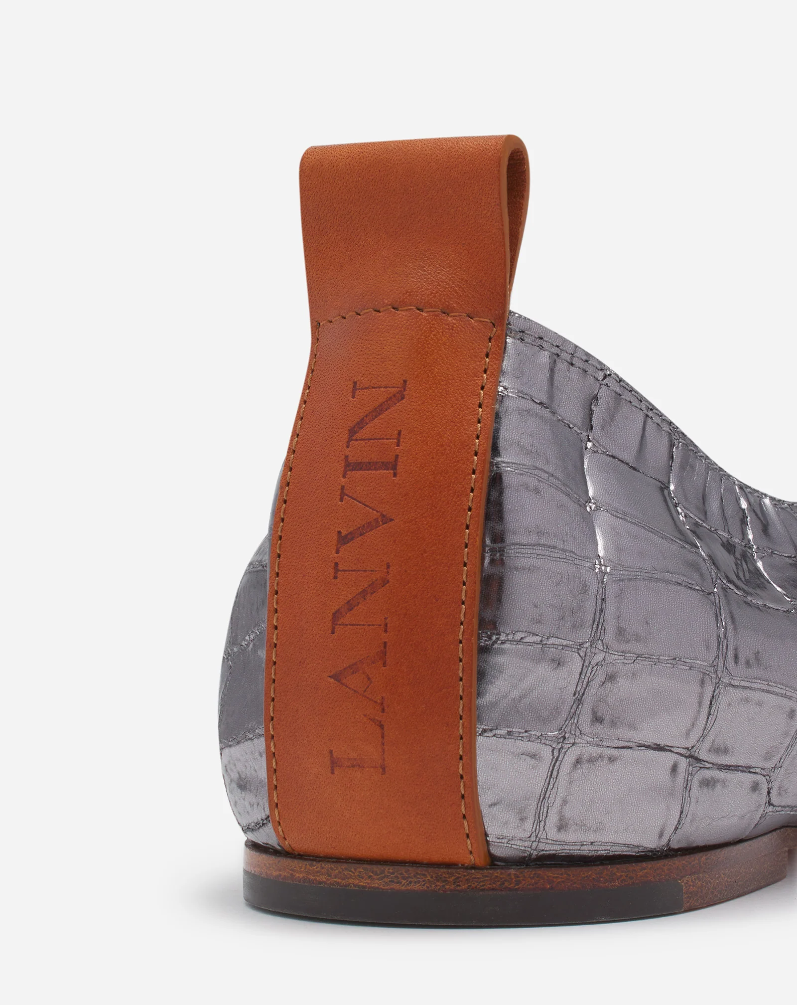 The ballerina in crocodile-effect leather