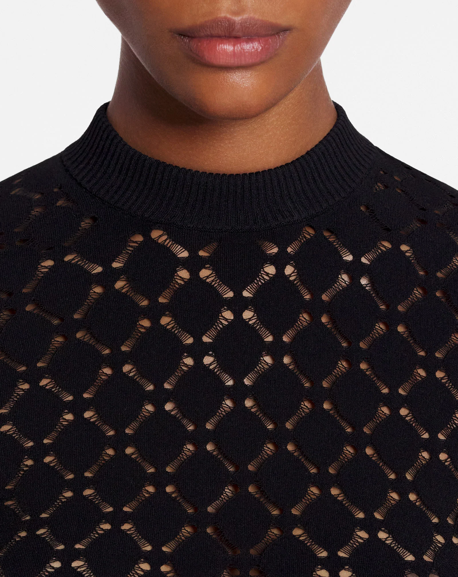Long-sleeved top in lace effect knit